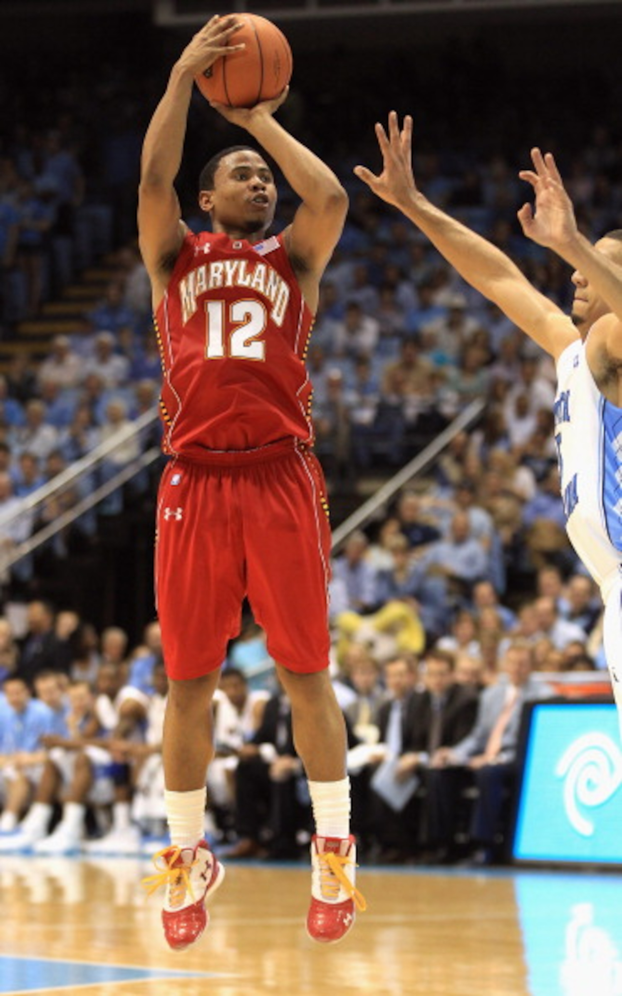 CHAPEL HILL, NC - FEBRUARY 27:  Terrell Stoglin #12 of the Maryland Terrapins shoots the ball over Kendall Marshall #5 of the North Carolina Tar Heels during their game at the Dean E. Smith Center on February 27, 2011 in Chapel Hill, North Carolina.  (Pho