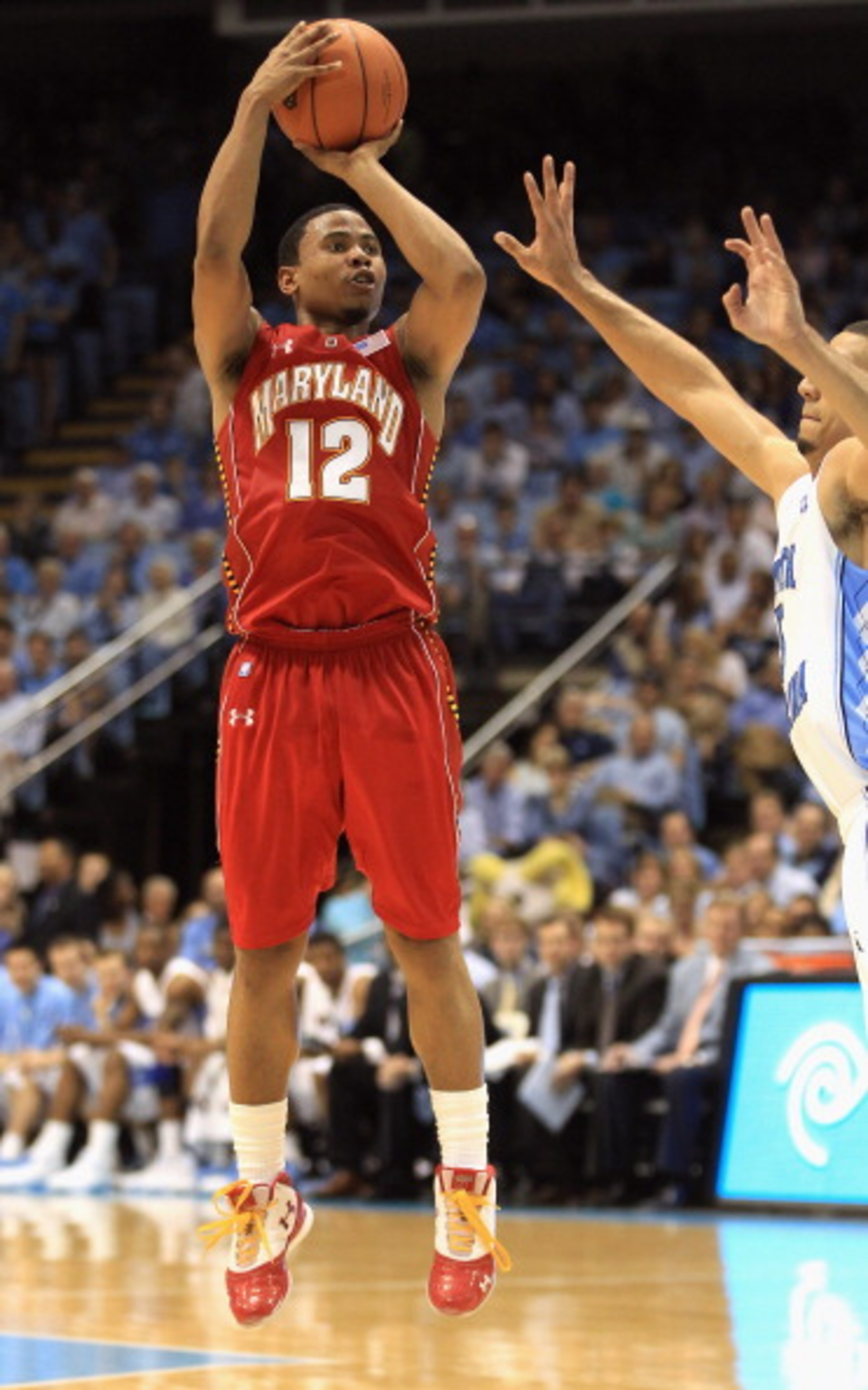 CHAPEL HILL, NC - FEBRUARY 27:  Terrell Stoglin #12 of the Maryland Terrapins shoots the ball over Kendall Marshall #5 of the North Carolina Tar Heels during their game at the Dean E. Smith Center on February 27, 2011 in Chapel Hill, North Carolina.  (Pho