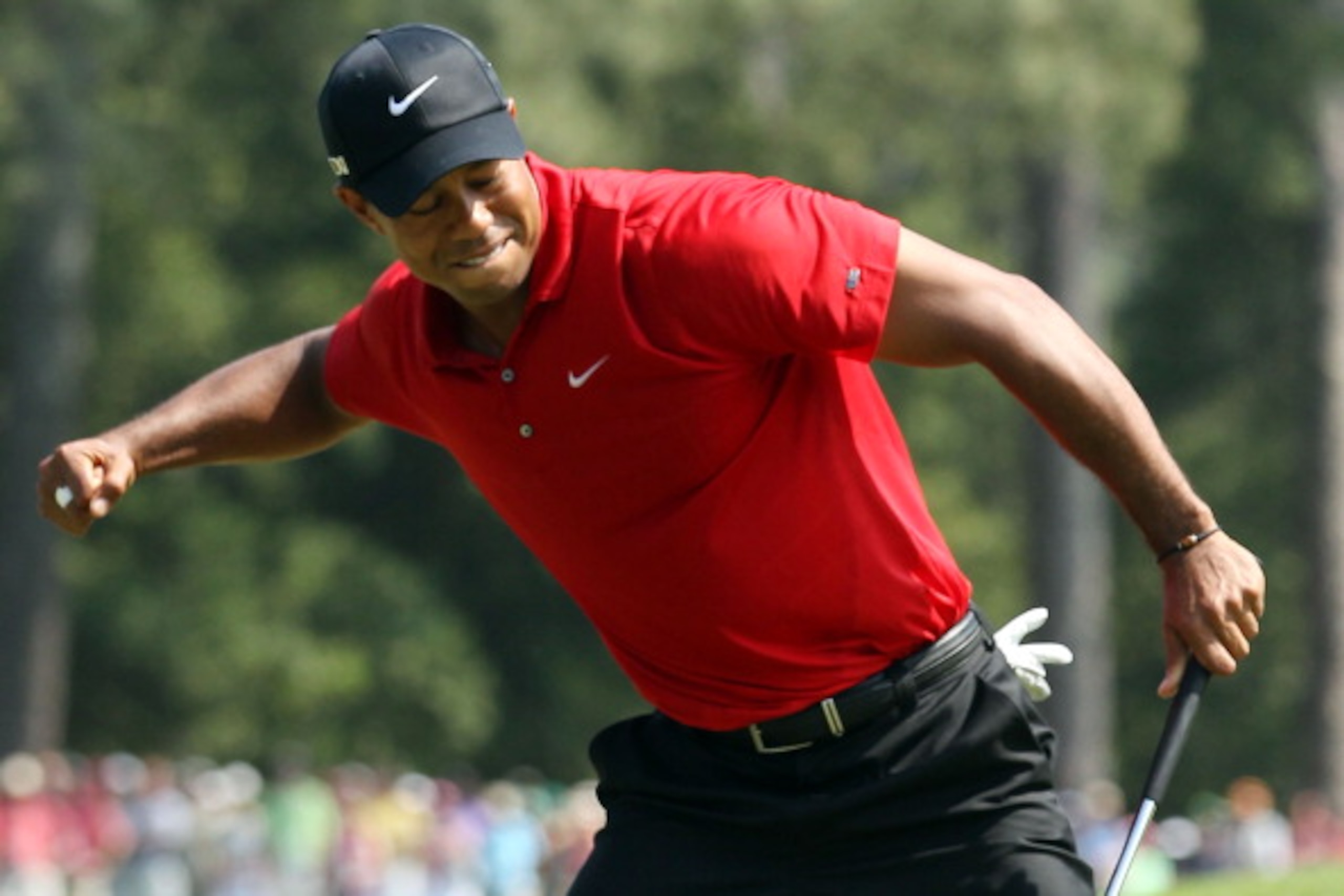 AUGUSTA, GA - APRIL 10: Tiger Woods celebrates after holing a putt for eagle on the eighth green during the final round of the 2011 Masters Tournament on April 10, 2011 in Augusta, Georgia. (Photo by Andrew Redington/Getty Images) AUGUSTA, GA - APRIL 10: Tiger Woods celebrates after holing a putt for eagle on the eighth green during the final round of the 2011 Masters Tournament on April 10, 2011 in Augusta, Georgia. (Photo by Andrew Redington/Getty Images)