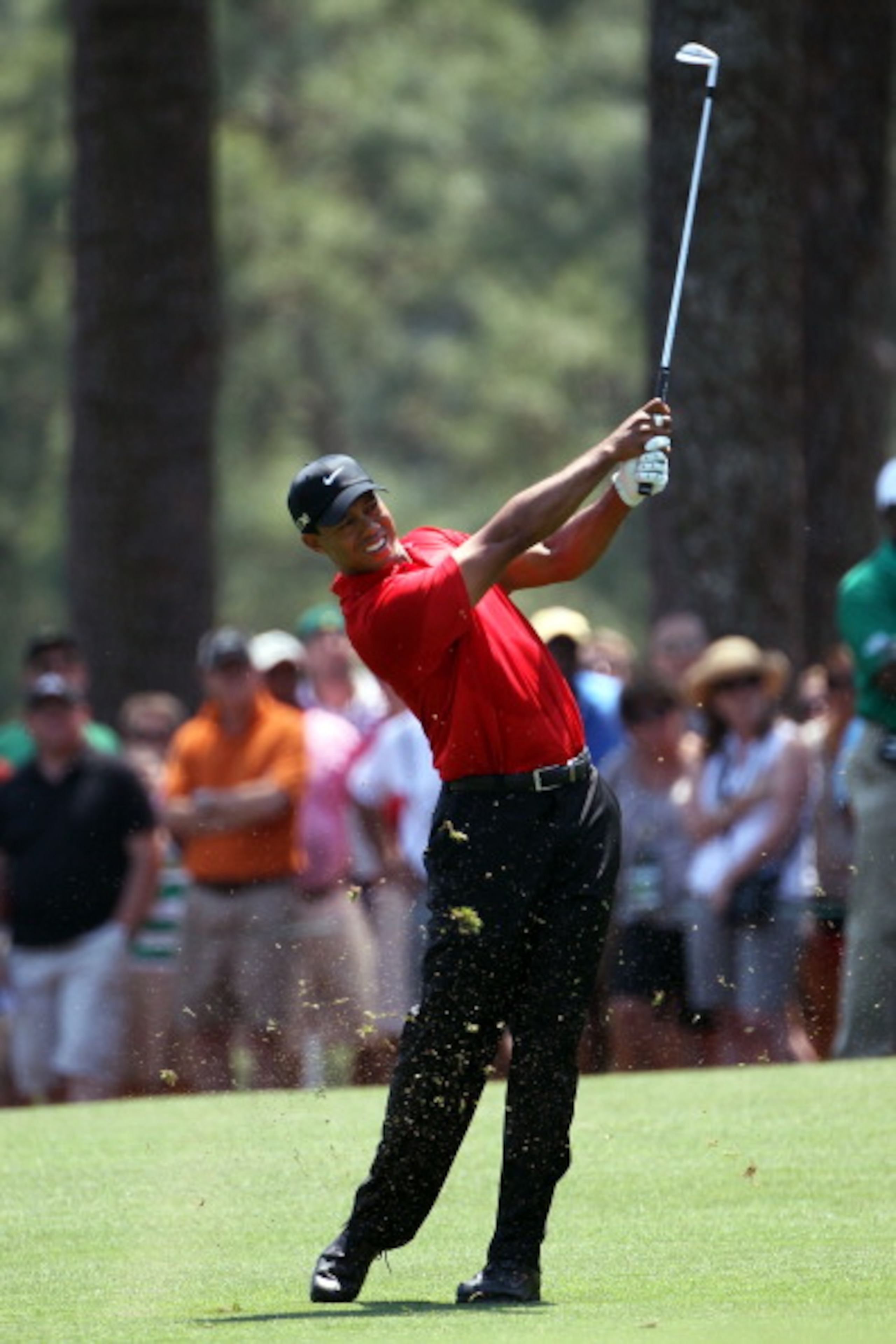 AUGUSTA, GA - APRIL 10: Tiger Woods plays a shot in the first fairway during the final round of the 2011 Masters Tournament at Augusta National Golf Club on April 10, 2011 in Augusta, Georgia. (Photo by Jamie Squire/Getty Images) AUGUSTA, GA - APRIL 10: Tiger Woods plays a shot in the first fairway during the final round of the 2011 Masters Tournament at Augusta National Golf Club on April 10, 2011 in Augusta, Georgia. (Photo by Jamie Squire/Getty Images)