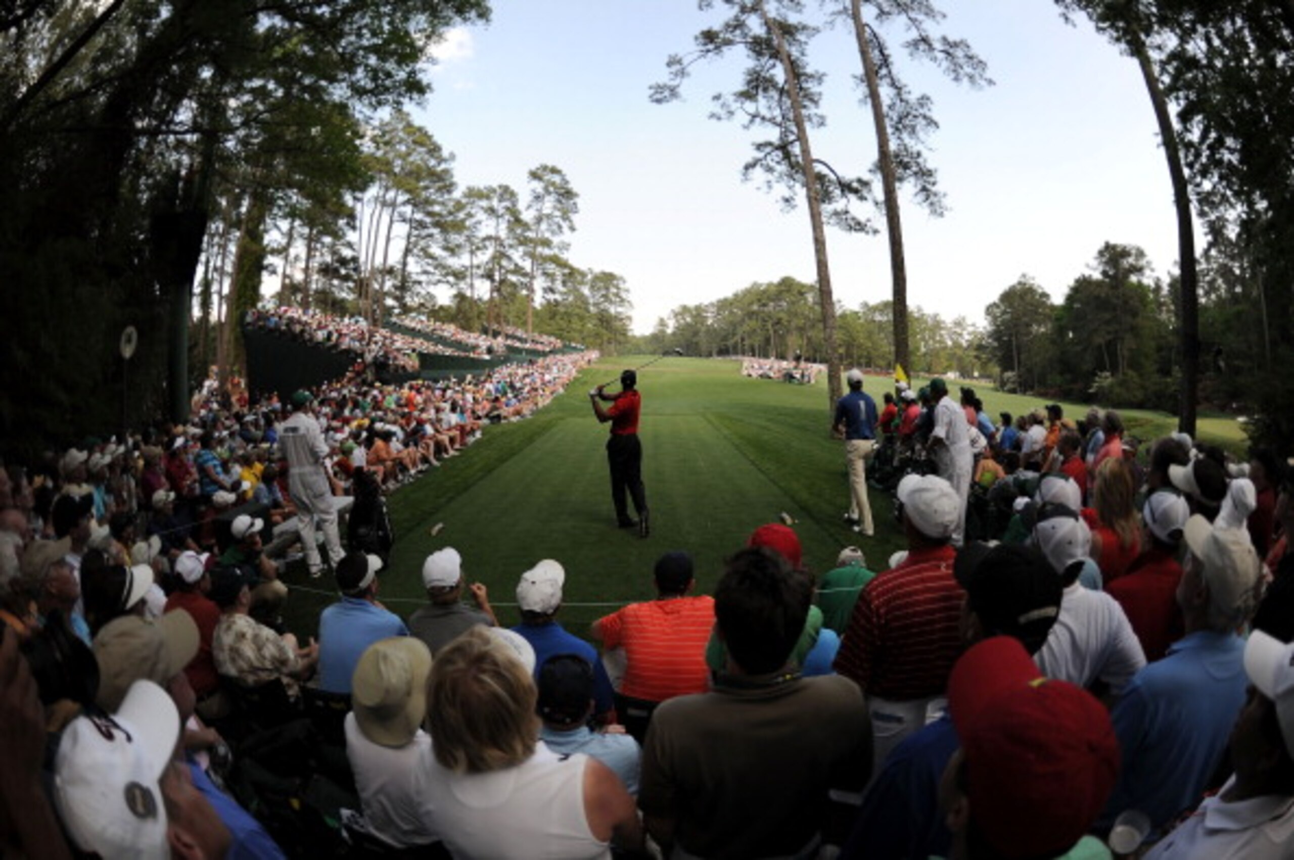 AUGUSTA, GA - APRIL 10: Tiger Woods hits his tee shot on the 14th hole during the final round of the 2011 Masters Tournament at Augusta National Golf Club on April 10, 2011 in Augusta, Georgia. (Photo by Harry How/Getty Images) AUGUSTA, GA - APRIL 10: Tiger Woods hits his tee shot on the 14th hole during the final round of the 2011 Masters Tournament at Augusta National Golf Club on April 10, 2011 in Augusta, Georgia. (Photo by Harry How/Getty Images)