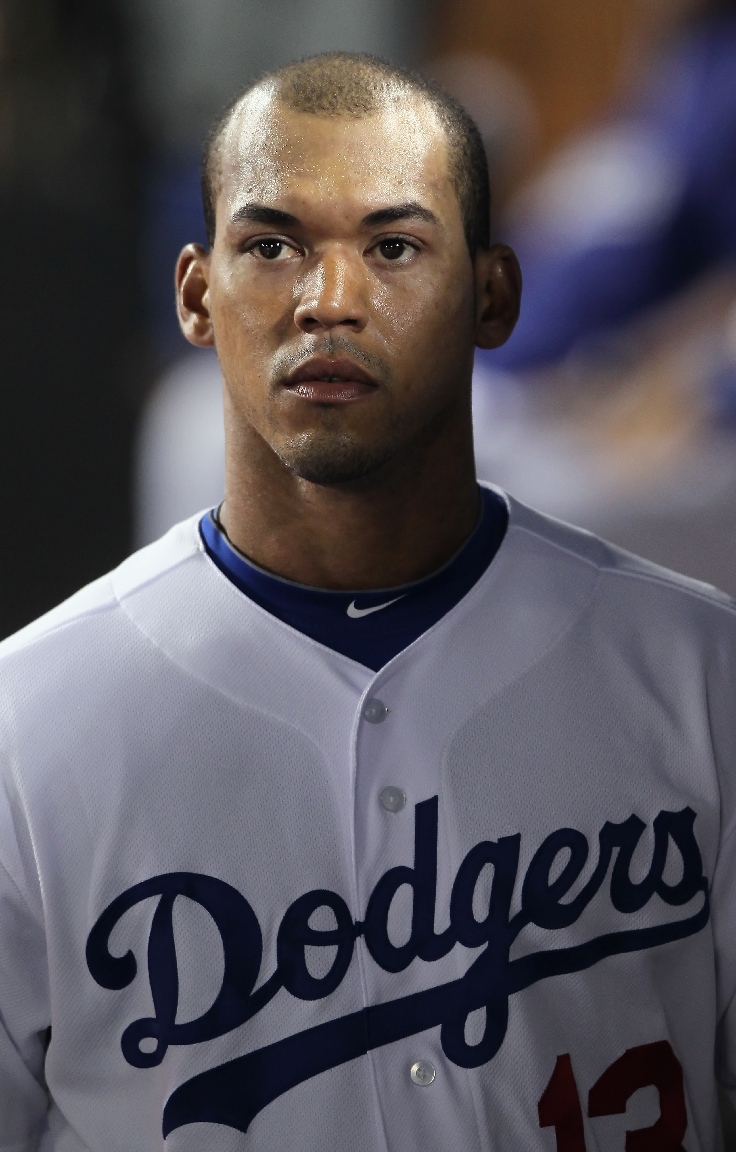 LOS ANGELES, CA - APRIL 01:  Ivan De Jesus #13 of the Los Angeles Dodgers looks on against the San Francisco Giants at Dodger Stadium on April 1, 2011 in Los Angeles, California.  (Photo by Jeff Gross/Getty Images)