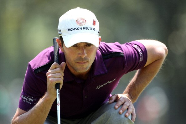 AUGUSTA, GA - APRIL 08:  Mike Weir of Canada lines up a putt on the first green during the second round of the 2011 Masters Tournament at Augusta National Golf Club on April 8, 2011 in Augusta, Georgia.  (Photo by Andrew Redington/Getty Images)