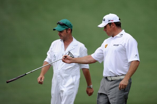 AUGUSTA, GA - APRIL 09:  Lee Westwood of England waits with his caddie Billy Foster on the second hole during the third round of the 2011 Masters Tournament at Augusta National Golf Club on April 9, 2011 in Augusta, Georgia.  (Photo by Harry How/Getty Ima