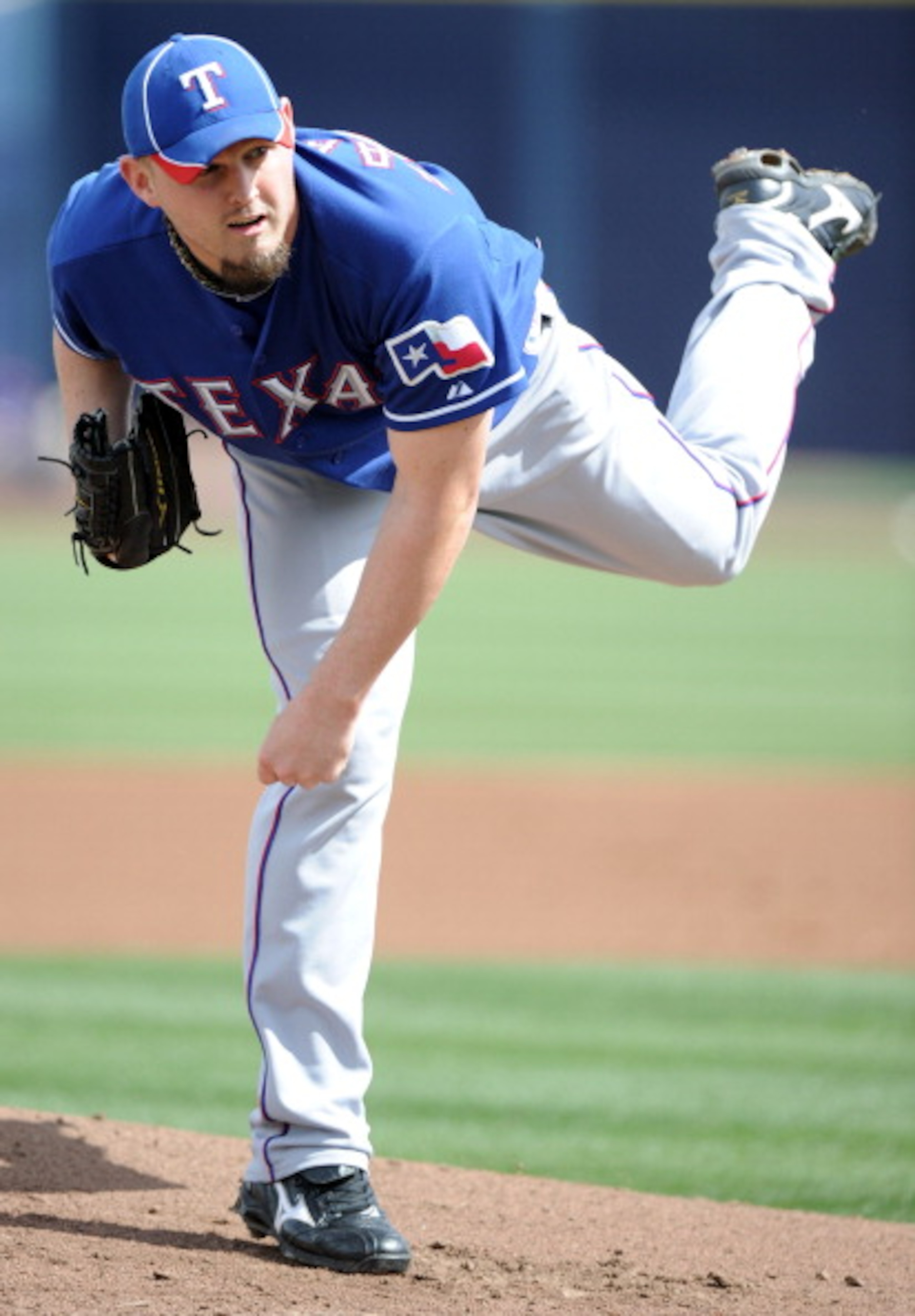 PEORIA, AZ - MARCH 01: Matt Harrison #54 of the Texas Rangers pitches against the Seattle Mariners in the first inning during spring training at Peoria Stadium on March 1, 2011 in Peoria, Arizona. (Photo by Harry How/Getty Images) PEORIA, AZ - MARCH 01: Matt Harrison #54 of the Texas Rangers pitches against the Seattle Mariners in the first inning during spring training at Peoria Stadium on March 1, 2011 in Peoria, Arizona. (Photo by Harry How/Getty Images)