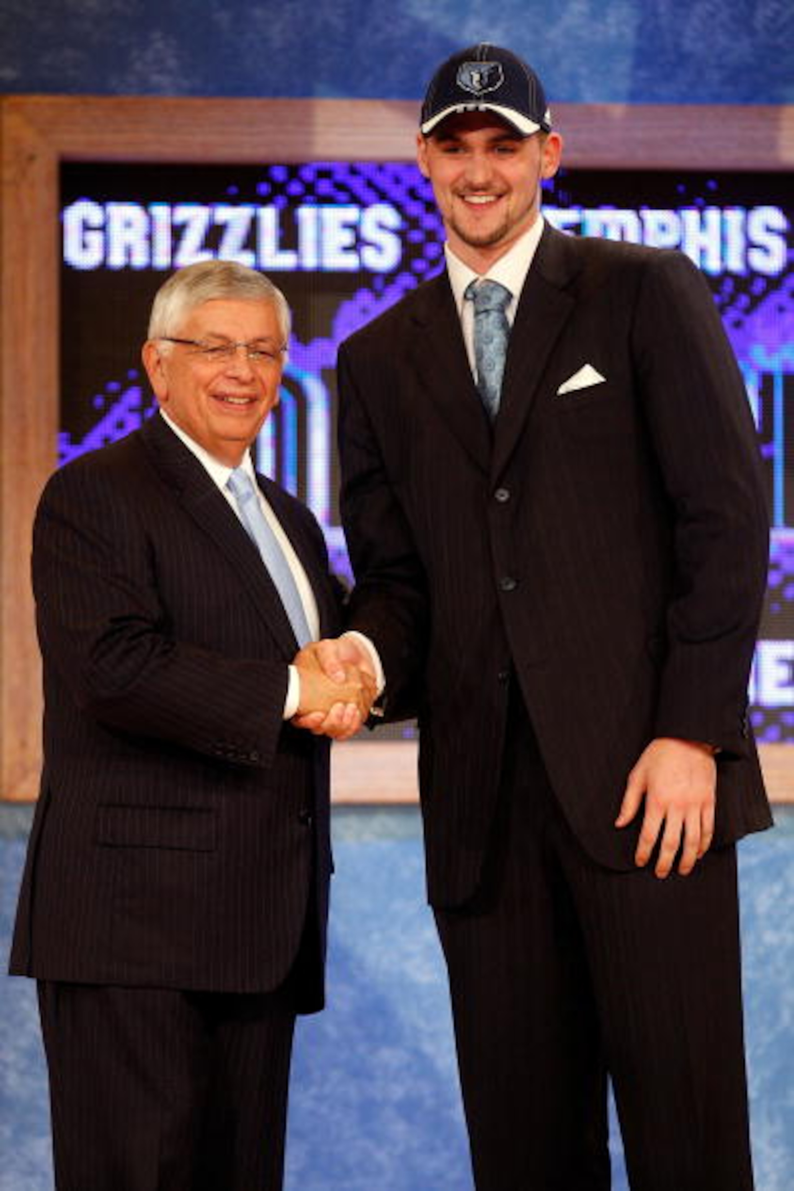 NEW YORK - JUNE 26:  NBA Commissioner David Stern shakes hands with number five draft pick for the Memphis Grizzlies, Kevin Love during the 2008 NBA Draft at the Wamu Theatre at Madison Square Garden June 26, 2008 in New York City. NOTE TO USER: User expr