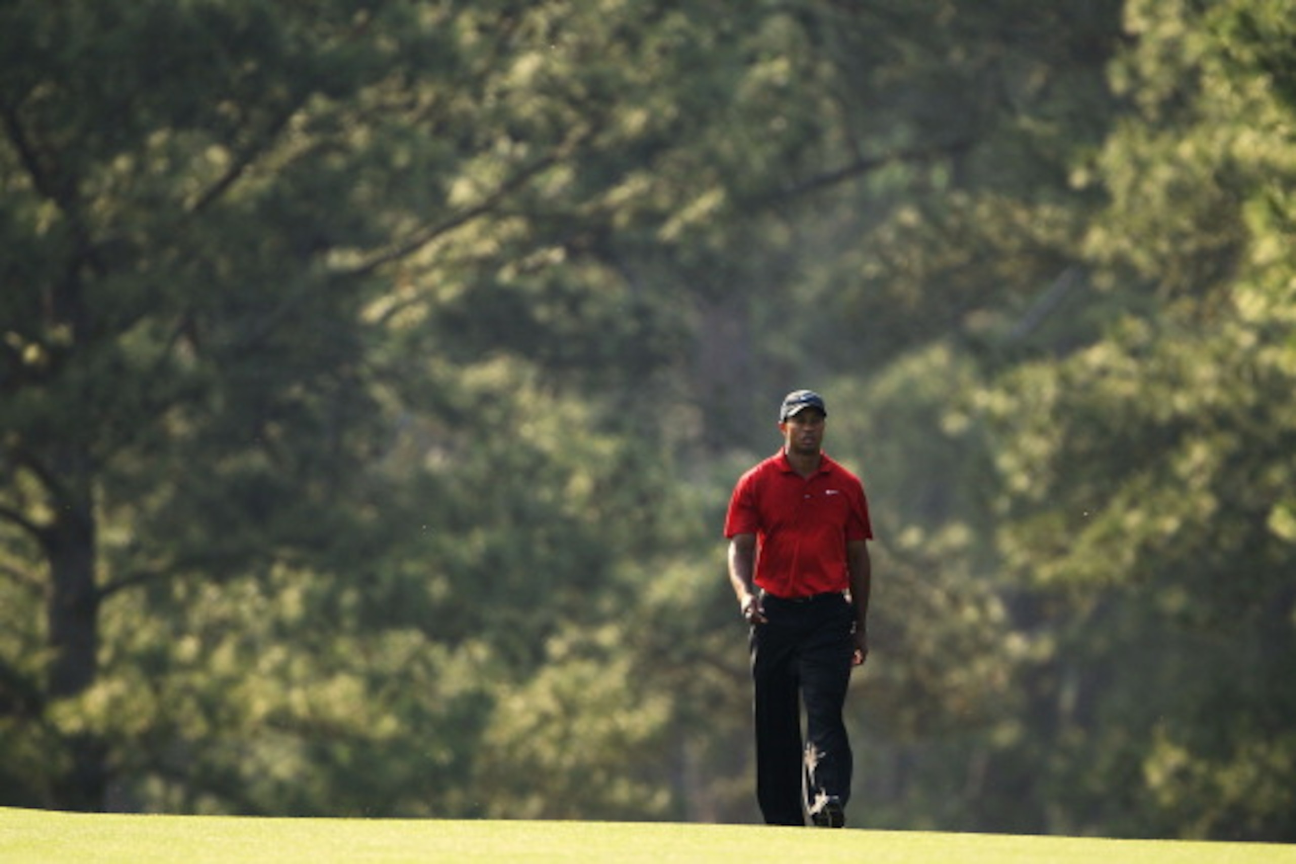 AUGUSTA, GA - APRIL 10: Tiger Woods walks up the 17th fairway during the final round of the 2011 Masters Tournament at Augusta National Golf Club on April 10, 2011 in Augusta, Georgia. (Photo by Jamie Squire/Getty Images) AUGUSTA, GA - APRIL 10: Tiger Woods walks up the 17th fairway during the final round of the 2011 Masters Tournament at Augusta National Golf Club on April 10, 2011 in Augusta, Georgia. (Photo by Jamie Squire/Getty Images)