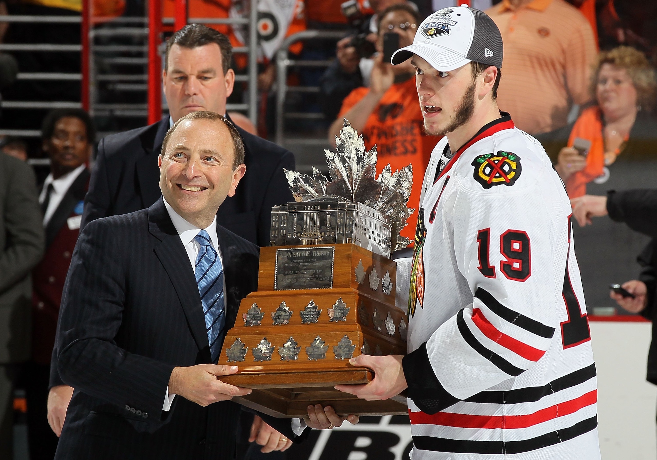 PHILADELPHIA - JUNE 09: NHL Commissioner Gary Bettman presents Jonathan Toews #19 of the Chicago Blackhawks with the Conn Smythe Trophy after teammate Patrick Kane scored the game-winning goal in overtime to defeat the Philadelphia Flyers 4-3 and win the PHILADELPHIA - JUNE 09: NHL Commissioner Gary Bettman presents Jonathan Toews #19 of the Chicago Blackhawks with the Conn Smythe Trophy after teammate Patrick Kane scored the game-winning goal in overtime to defeat the Philadelphia Flyers 4-3 and win the