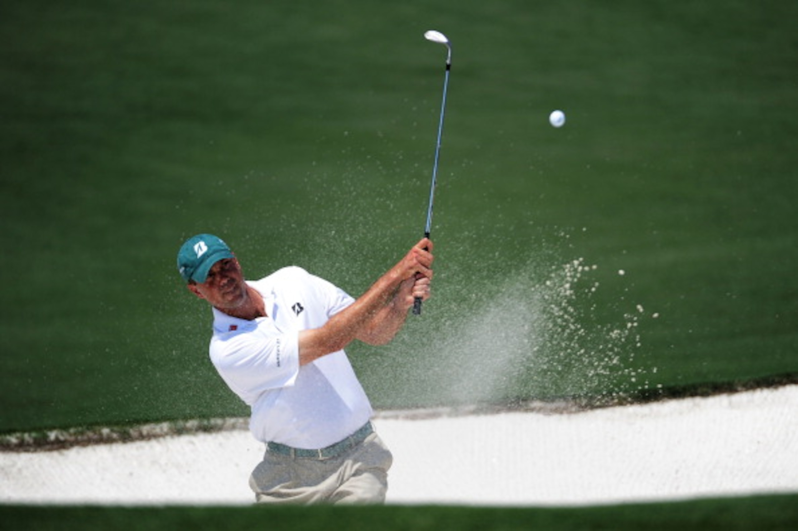 AUGUSTA, GA - APRIL 10:  Matt Kuchar hits from a bunker on the second hole  during the final round of the 2011 Masters Tournament at Augusta National Golf Club on April 10, 2011 in Augusta, Georgia.  (Photo by Harry How/Getty Images)