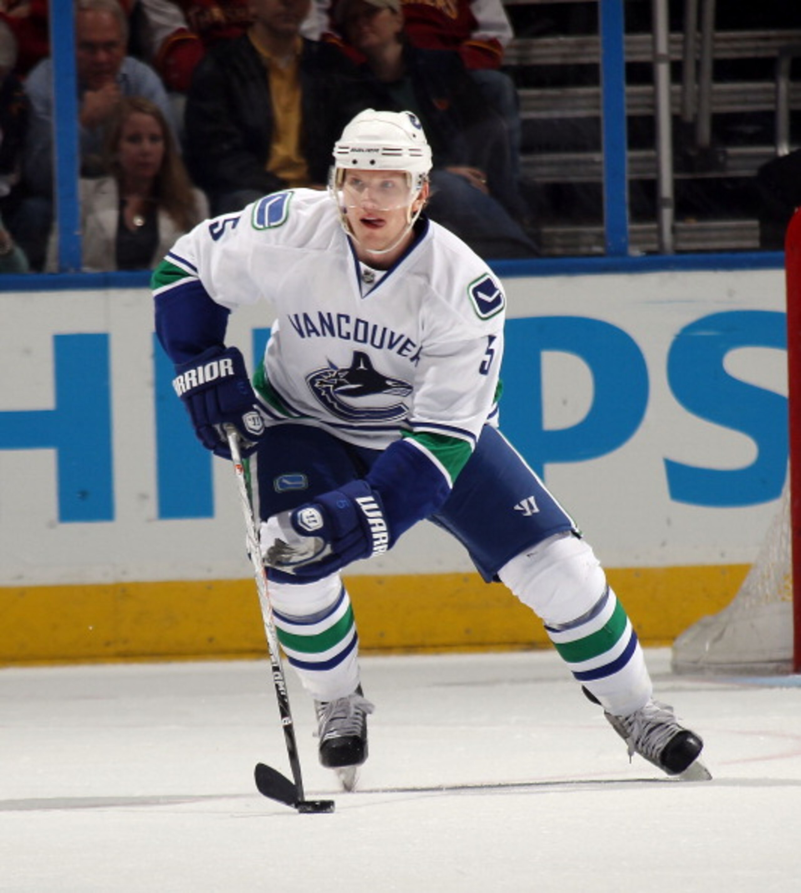 ATLANTA, GA - MARCH 25:  Christian Ehrhoff #5 of the Vancouver Canucks skates against the Atlanta Thrashers at the Philips Arena on March 25, 2011 in Atlanta, Georgia.  (Photo by Bruce Bennett/Getty Images)