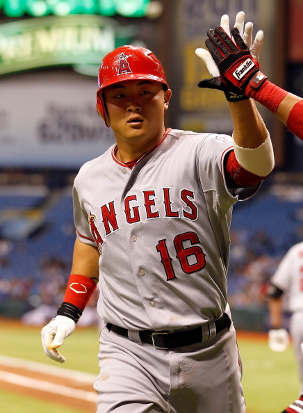 ST. PETERSBURG, FL - APRIL 05:  Hank Conger #16 of the Los Angeles Angels of Anaheim is congratulated after his second-inning home run against the Tampa Bay Rays during the game at Tropicana Field on April 5, 2011 in St. Petersburg, Florida.  (Photo by J.