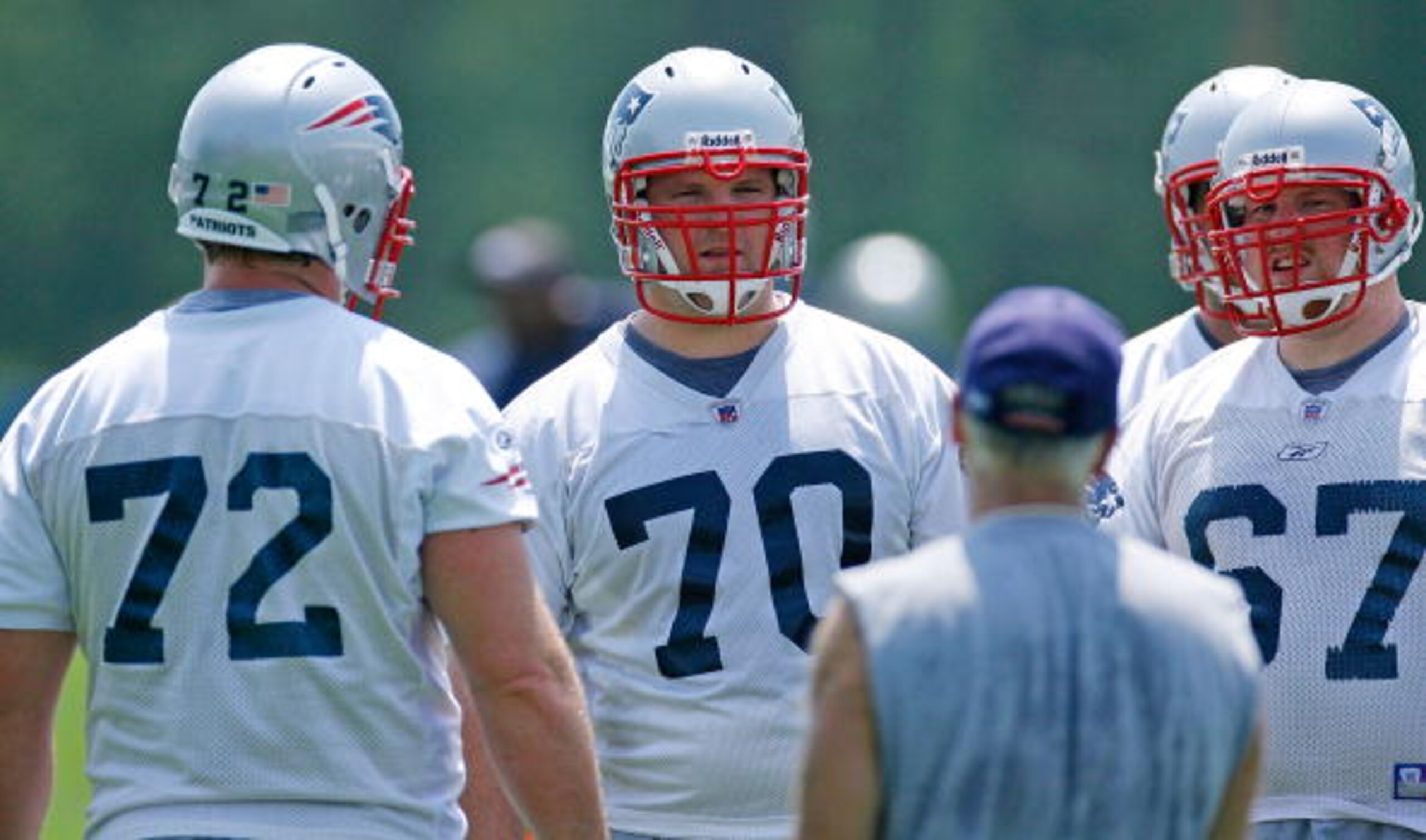 FOXBORO, MA - JUNE 7: Matt Light #22, Logan Mankins #70 and Dan Koppen #67 of the New England Patriots listen to instruction during Mini Camp at Gillette Stadium on June 7, 2008 in Foxboro, Massachusetts. (Photo by Jim Rogash/Getty Images) FOXBORO, MA - JUNE 7: Matt Light #22, Logan Mankins #70 and Dan Koppen #67 of the New England Patriots listen to instruction during Mini Camp at Gillette Stadium on June 7, 2008 in Foxboro, Massachusetts. (Photo by Jim Rogash/Getty Images)