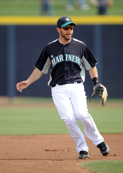 PEORIA, AZ - MARCH 01:  Dustin Ackley #13 of the Seattle Mariners plays second base against the Texas Rangers during spring training at Peoria Stadium on March 1, 2011 in Peoria, Arizona.  (Photo by Harry How/Getty Images)