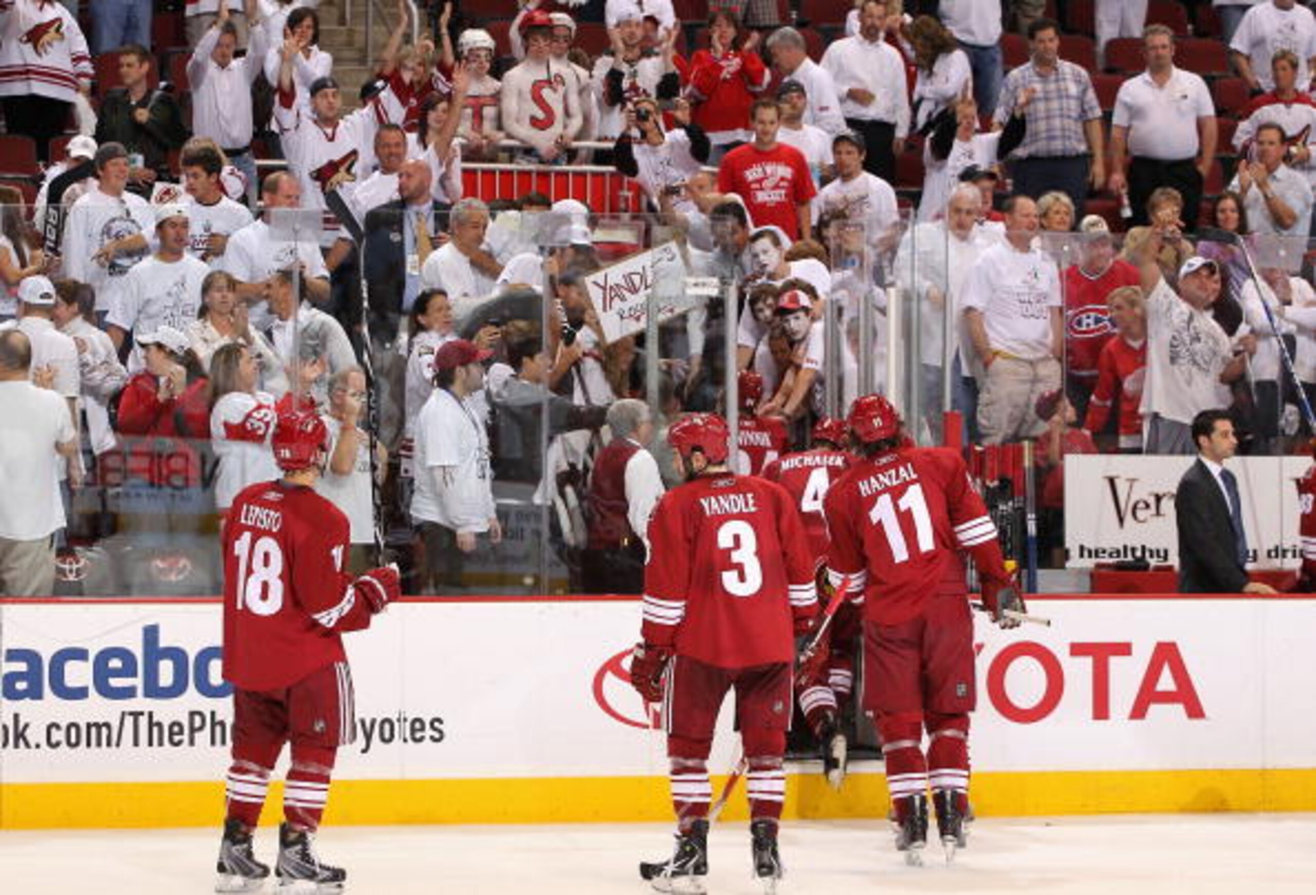 GLENDALE, AZ - APRIL 27:  The Phoenix Coyotes skate off the ice following Game Seven of the Western Conference Quarterfinals against the Detroit Red Wings during the 2010 NHL Stanley Cup Playoffs at Jobing.com Arena on April 27, 2010 in Glendale, Arizona.
