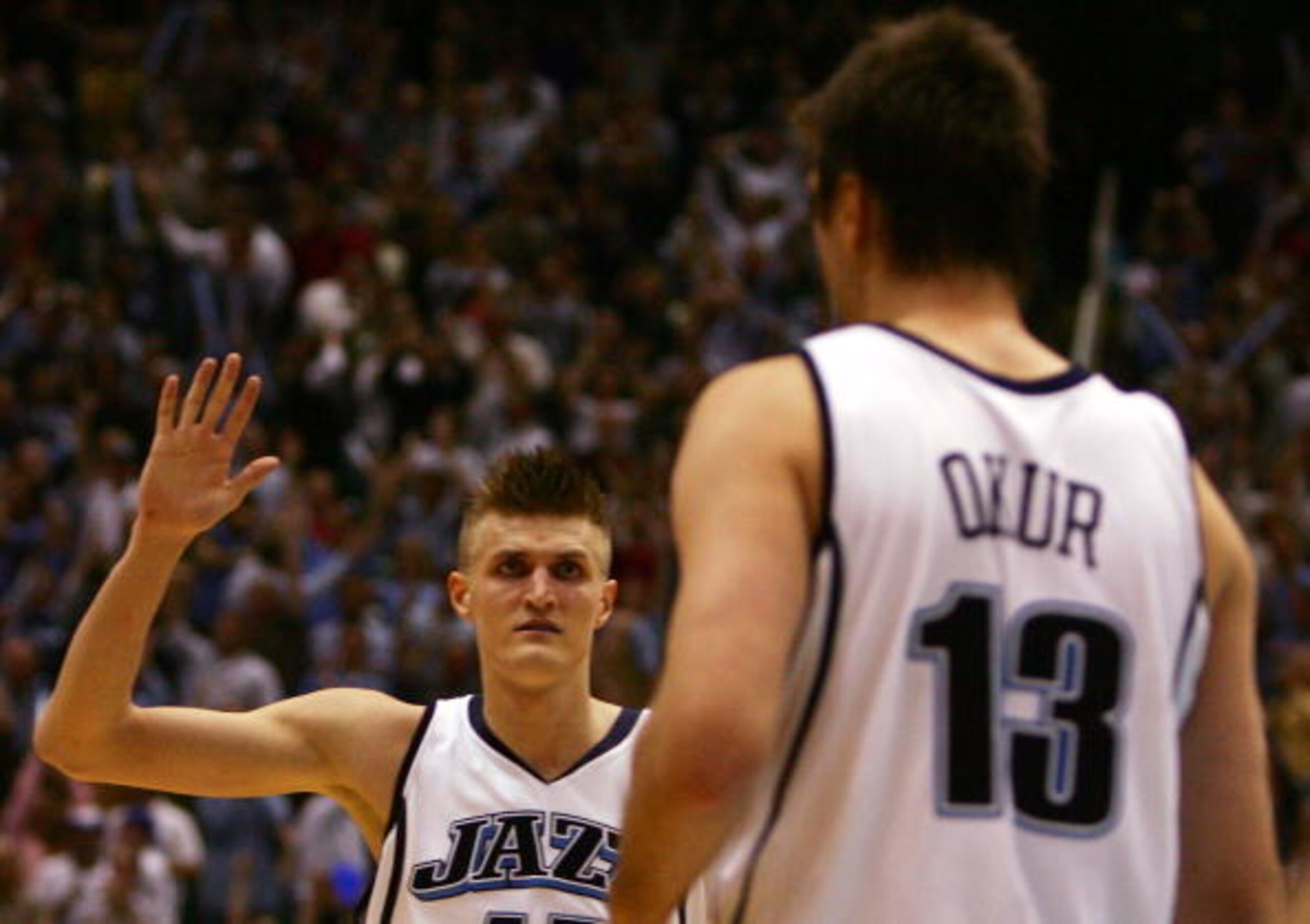 SALT LAKE CITY - MAY 03:  Andrei Kirilenko #47 of the Utah Jazz celebrates a Mehmet Okur #13 three pointer against the Houston Rockets in the fourth quarter during Game Six of the Western Conference Quarterfinals during the 2007 NBA Playoffs at the Energy