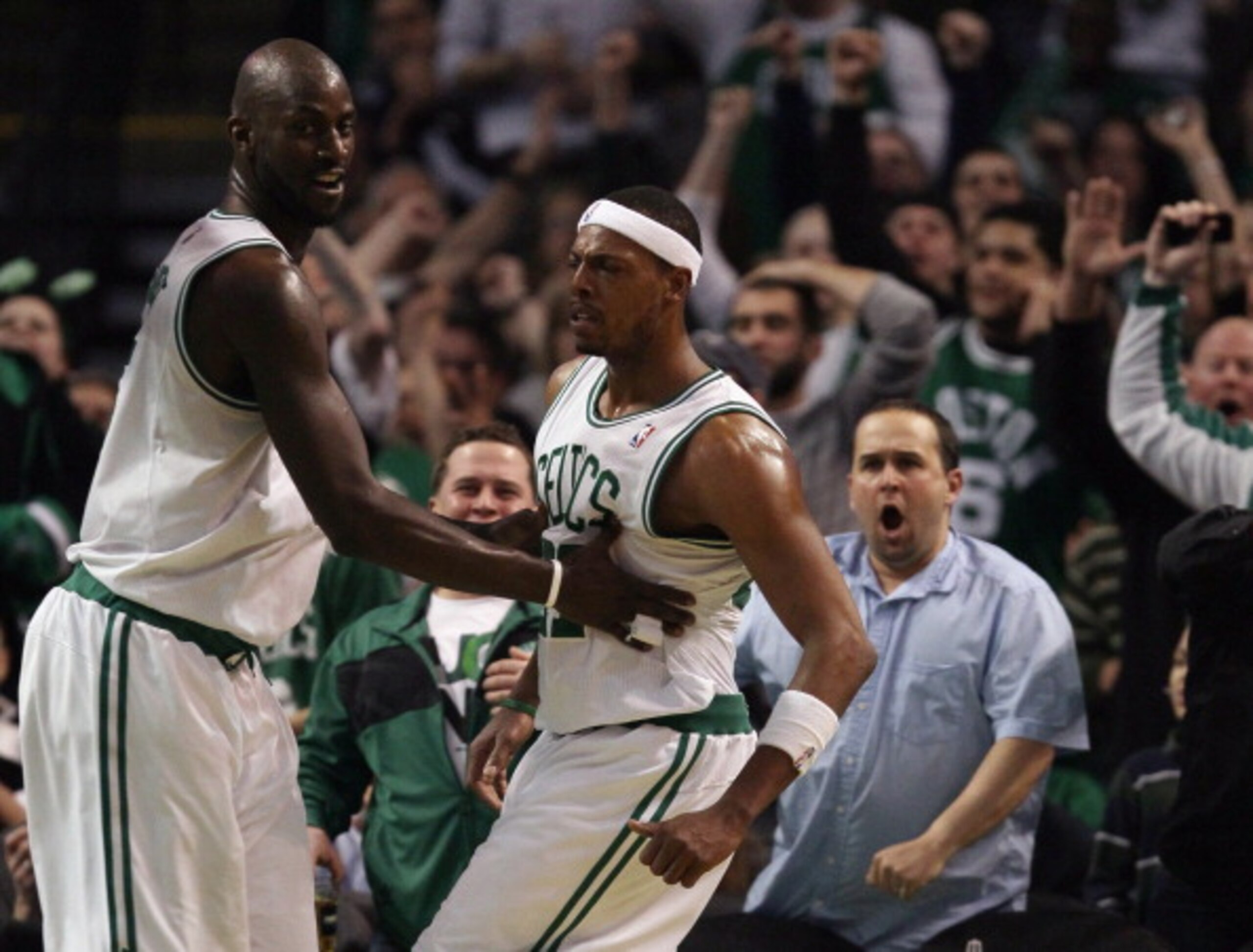 BOSTON, MA - MARCH 02: Paul Pierce #34 is congratulated by teammate Kevin Garnett #5 of the Boston Celtics on March 2, 2011 at the TD Garden in Boston, Massachusetts. The Celtics defeated the Phoenix Suns 115-103. NOTE TO USER: User expressly acknowled BOSTON, MA - MARCH 02: Paul Pierce #34 is congratulated by teammate Kevin Garnett #5 of the Boston Celtics on March 2, 2011 at the TD Garden in Boston, Massachusetts. The Celtics defeated the Phoenix Suns 115-103. NOTE TO USER: User expressly acknowled