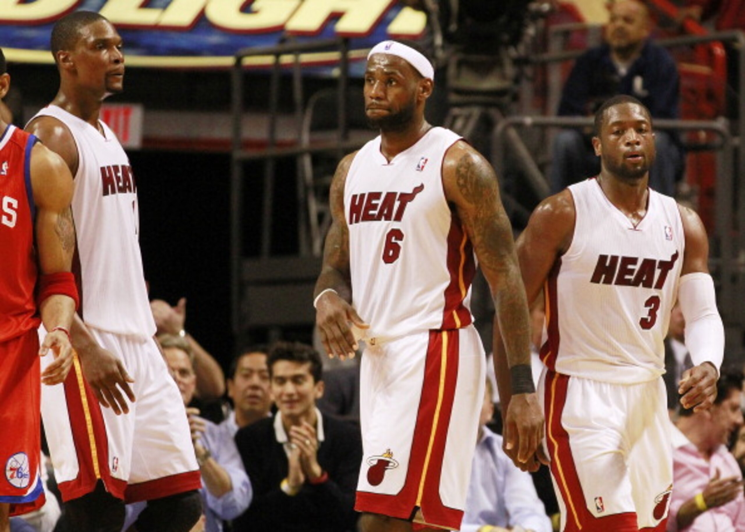 MIAMI, FL - MARCH 25: Forward Chris Bosh #1, Forward LeBron James #6 and Guard Dwyane Wade #3 of the Miami Heat against the Philadelphia Sixers at American Airlines Arena on March 25, 2011 in Miami, Florida. The Heat defeated the Sixers 111-99. NOTE TO U MIAMI, FL - MARCH 25: Forward Chris Bosh #1, Forward LeBron James #6 and Guard Dwyane Wade #3 of the Miami Heat against the Philadelphia Sixers at American Airlines Arena on March 25, 2011 in Miami, Florida. The Heat defeated the Sixers 111-99. NOTE TO U