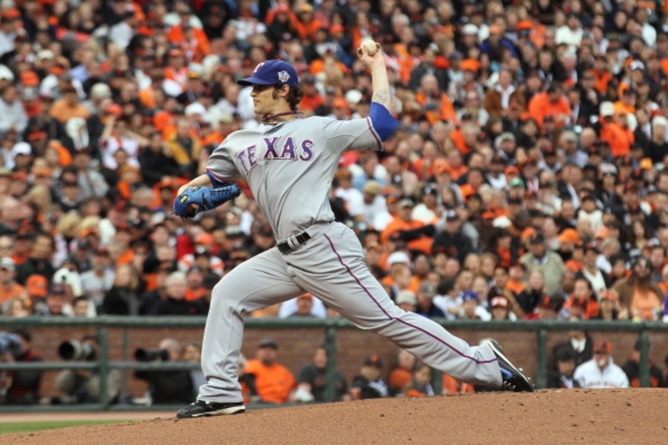 SAN FRANCISCO - OCTOBER 28:  Starting pitcher C.J. Wilson #36 of the Texas Rangers pitches against the San Francisco Giants in Game Two of the 2010 MLB World Series at AT&T Park on October 28, 2010 in San Francisco, California.  (Photo by Justin Sullivan/