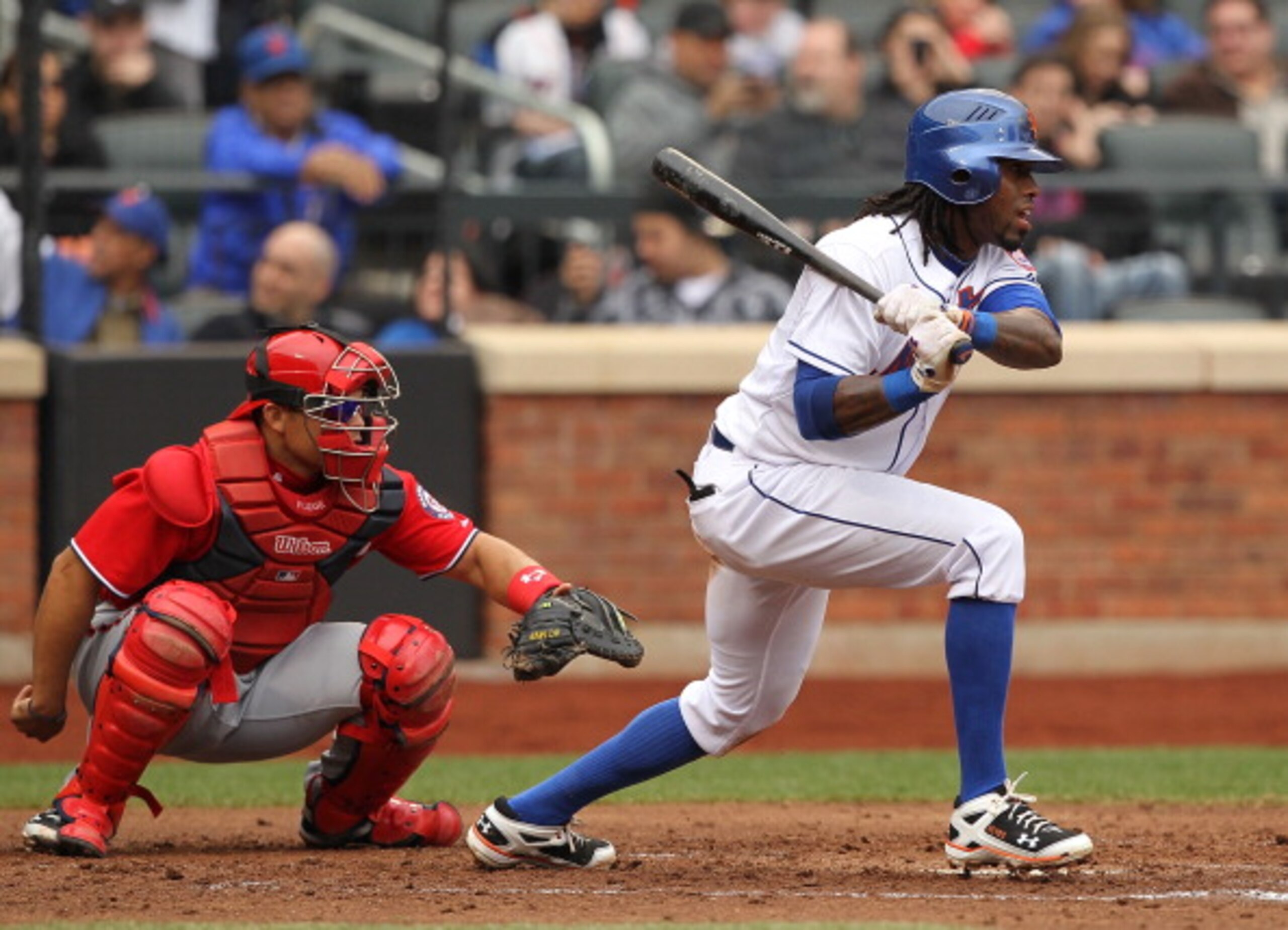 NEW YORK, NY - APRIL 10:  Jose Reyes #7 of the New York Mets gets a hit against  the Washington Nationals during their game on April 10, 2011 at Citi Field in the Flushing neighborhood of the Queens borough of New York City.  (Photo by Al Bello/Getty Imag