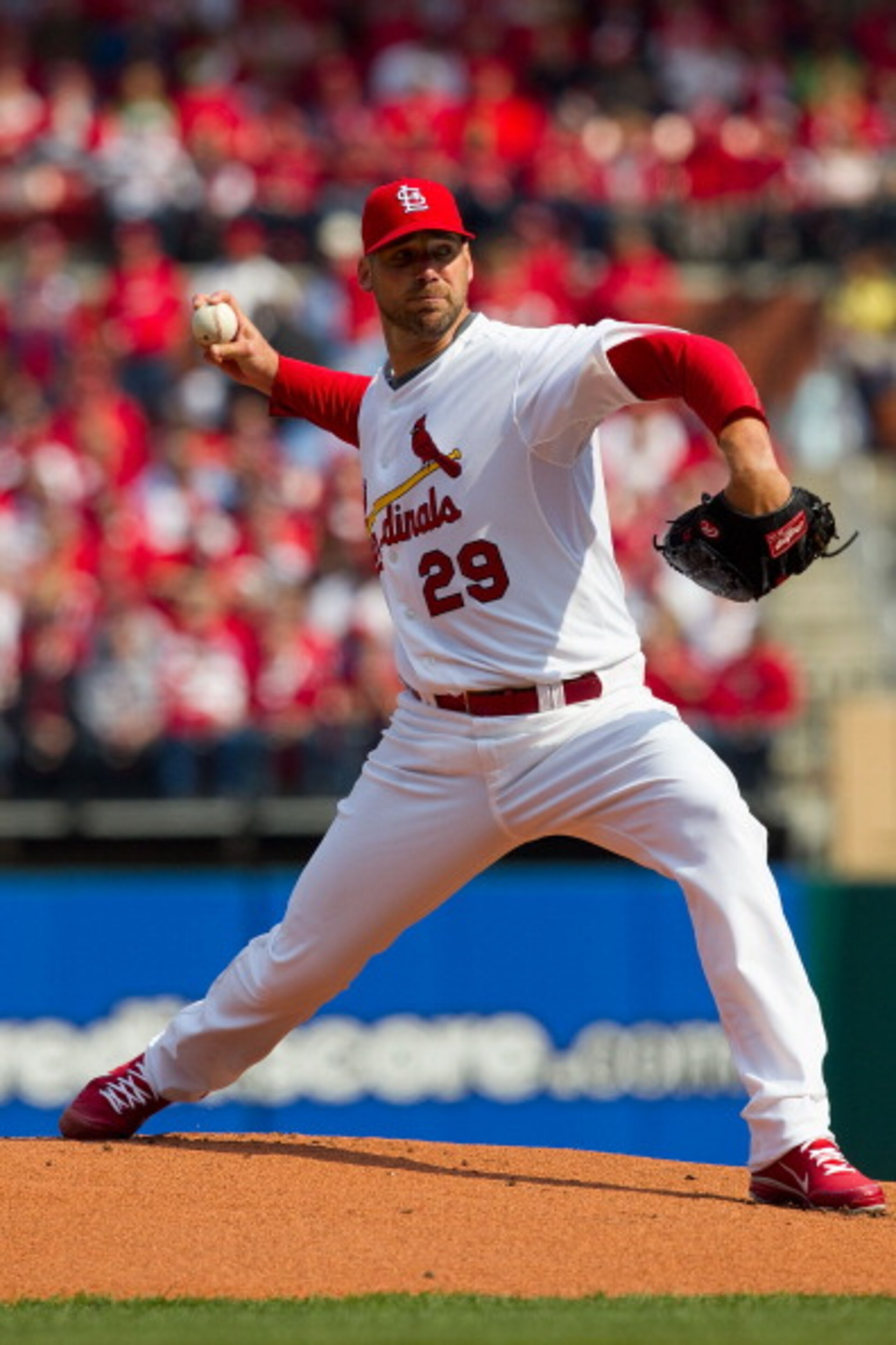 ST. LOUIS, MO - MARCH 31: Starter Chris Carpenter #29 of the St. Louis Cardinals pitches against the San Diego Padres on opening day at Busch Stadium on March 31, 2011 in St. Louis, Missouri.  (Photo by Dilip Vishwanat/Getty Images)