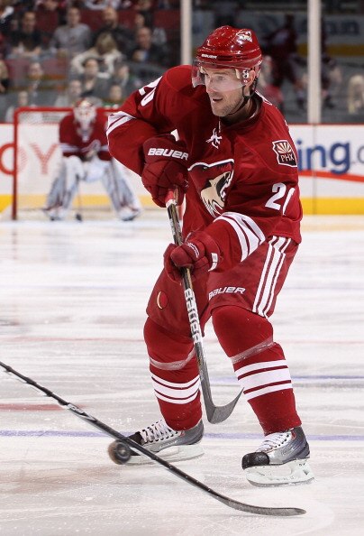 GLENDALE, AZ - APRIL 01:  Eric Belanger #20 of the Phoenix Coyotes skates with the puck during the NHL game against the Colorado Avalanche at Jobing.com Arena on April 1, 2011 in Glendale, Arizona.  The Avalanche defeated the Coyotes 4-3 in an overtime sh