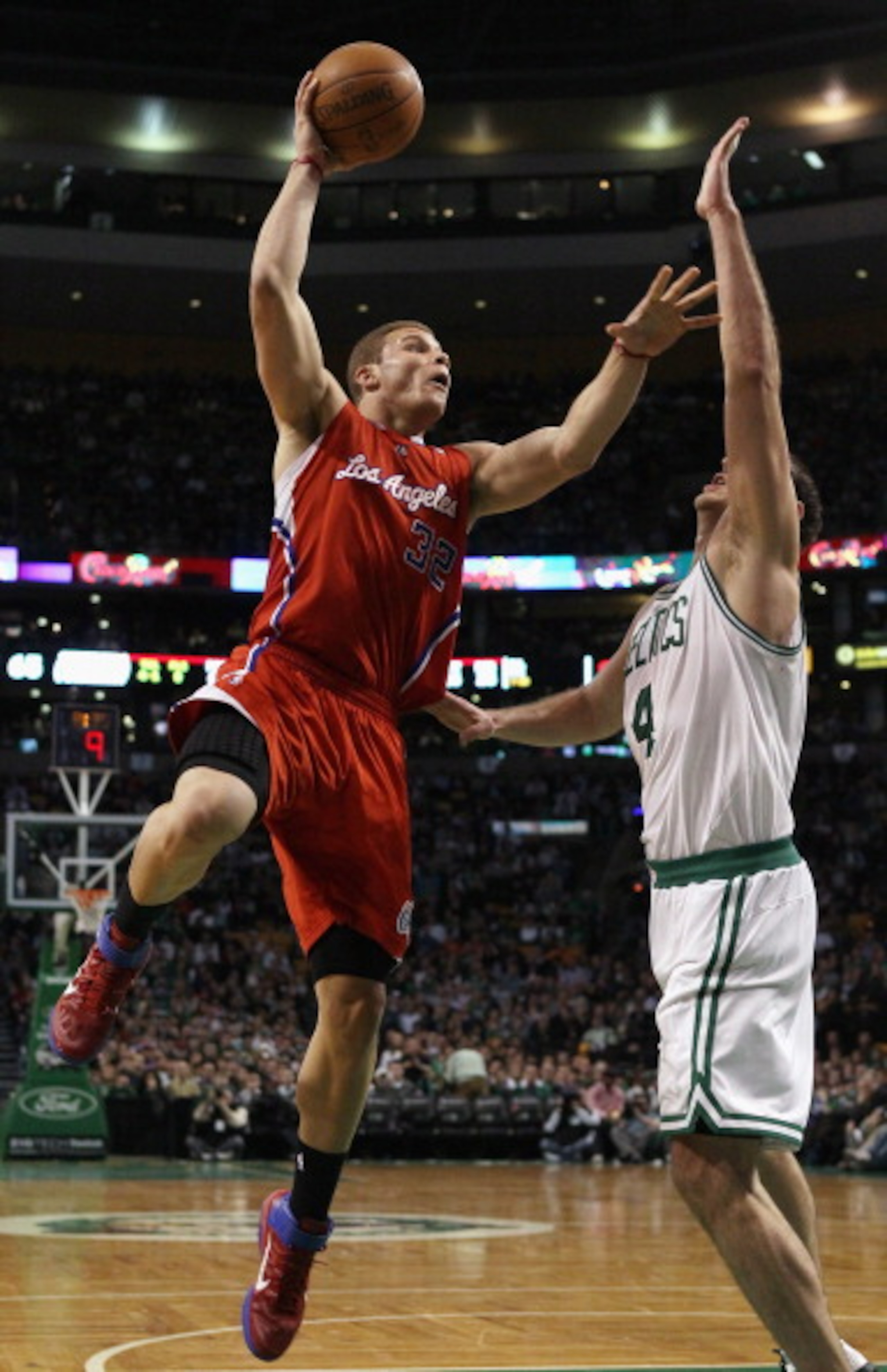 BOSTON, MA - MARCH 09:  Blake Griffin #32 of the Los Angeles Clippers takes a shot as Nenad Krstic #4 of the Boston Celtics defends on March 9, 2011 at the TD Garden in Boston, Massachusetts. The Los Angeles Clippers defeated the Boston Celtics 108-103. N