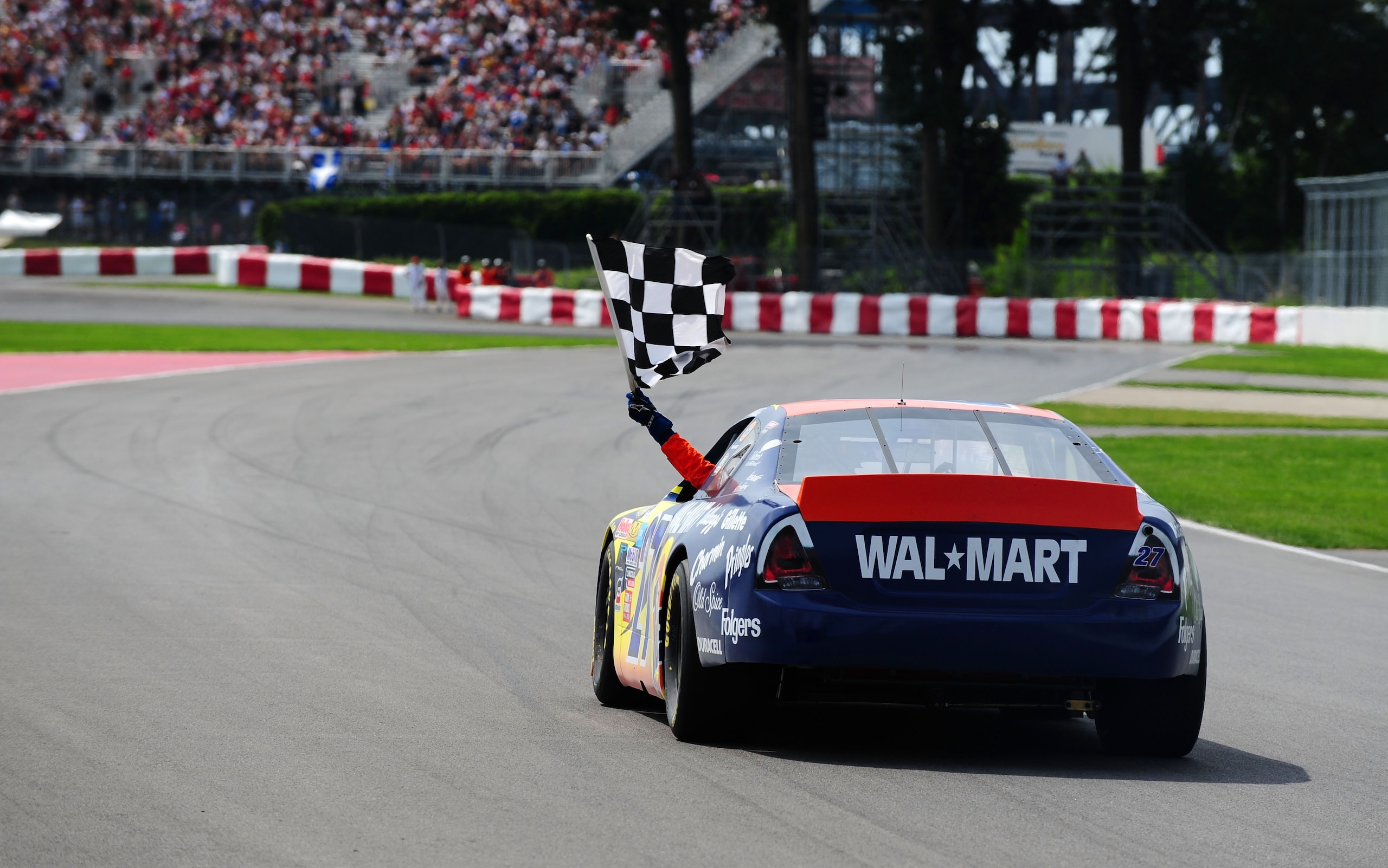 MONTREAL - AUGUST 02:  Andrew Ranger driver of the #27 Wal Mart Tide celebrates after winning the NASCAR Canadian Tire Series Napa Auto Pro 100 on August 2, 2008 at the Circuit Gilles Villeneuve in Montreal, Quebec, Canada.  (Photo by Robert Laberge/Getty