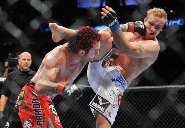 PORTLAND, OR - AUGUST 29: UFC fighter Chris Leben (L) battles UFC fighter Jake Rosholt (R) during their Middleweight bout at UFC 102: Couture vs. Nogueira at the Rose Garden Arena on August 29, 2009 in Portland, Oregon. (Photo by Jon Kopaloff/Getty Ima PORTLAND, OR - AUGUST 29: UFC fighter Chris Leben (L) battles UFC fighter Jake Rosholt (R) during their Middleweight bout at UFC 102: Couture vs. Nogueira at the Rose Garden Arena on August 29, 2009 in Portland, Oregon. (Photo by Jon Kopaloff/Getty Ima