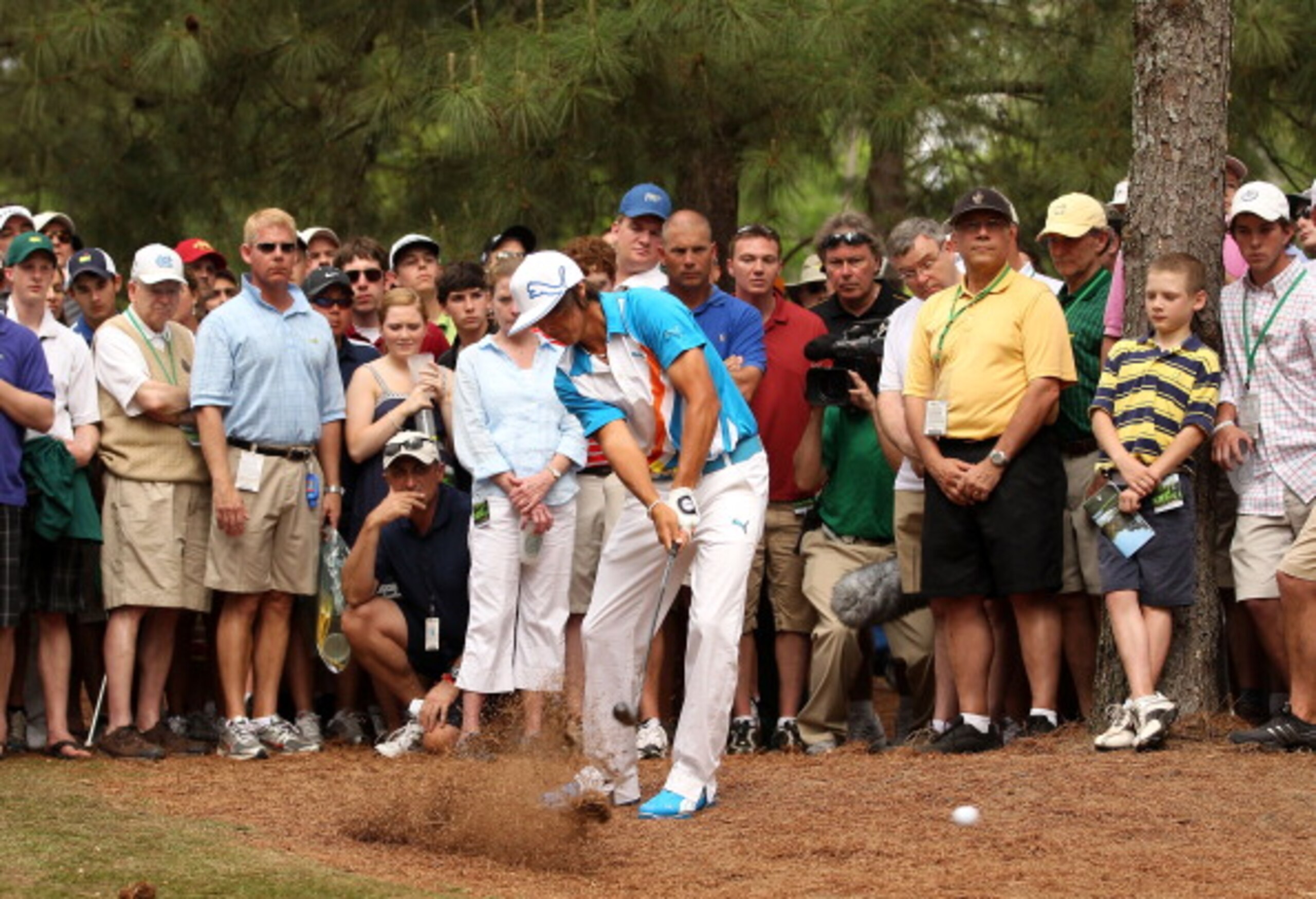 AUGUSTA, GA - APRIL 08: Rickie Fowler hits his shot from the rough on the 11th hole during the second round of the 2011 Masters Tournament at Augusta National Golf Club on April 8, 2011 in Augusta, Georgia. (Photo by Andrew Redington/Getty Images) AUGUSTA, GA - APRIL 08: Rickie Fowler hits his shot from the rough on the 11th hole during the second round of the 2011 Masters Tournament at Augusta National Golf Club on April 8, 2011 in Augusta, Georgia. (Photo by Andrew Redington/Getty Images)