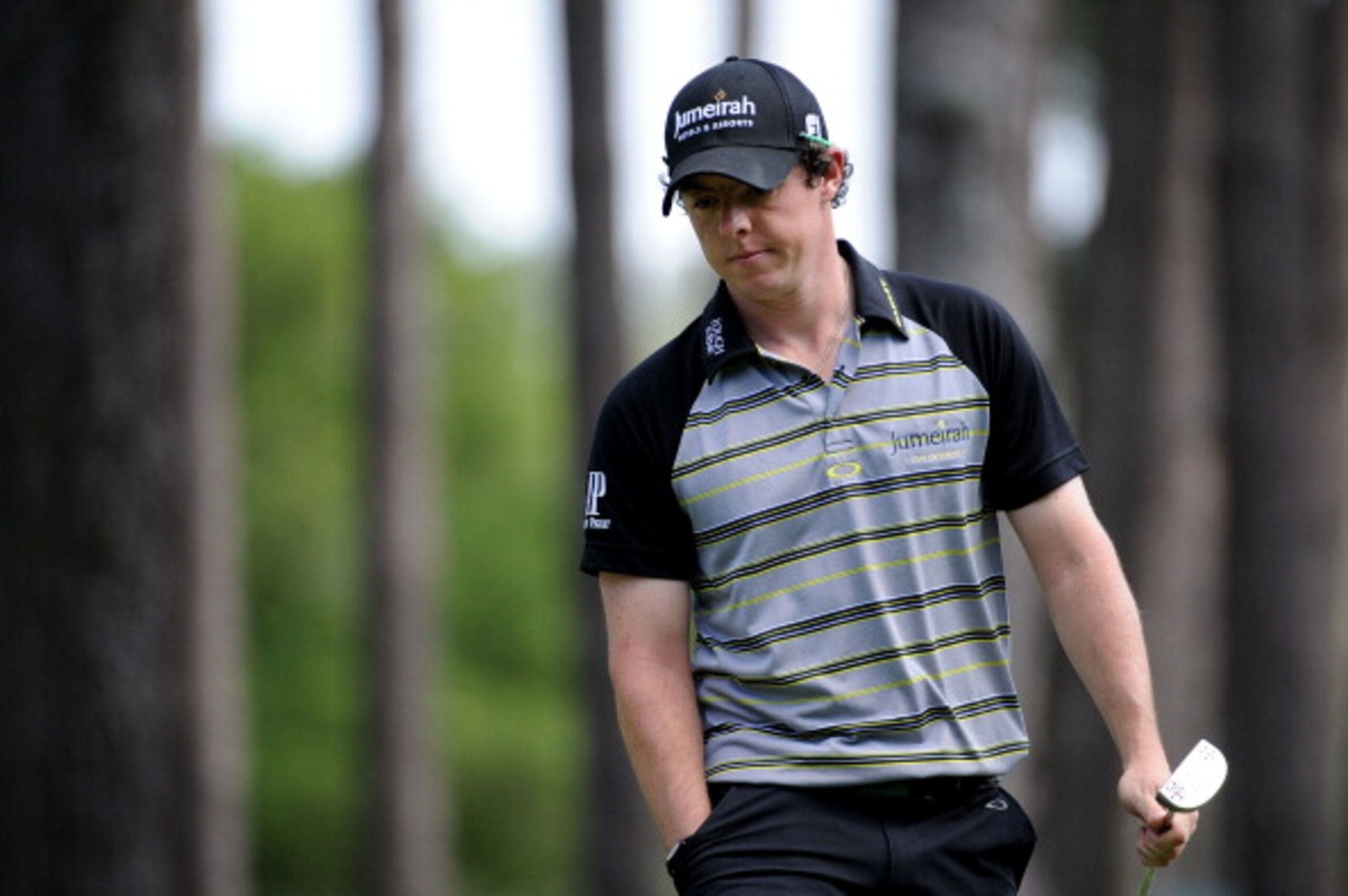AUGUSTA, GA - APRIL 10: Rory McIlroy of Northern Ireland walks across the sixth green during the final round of the 2011 Masters Tournament on April 10, 2011 in Augusta, Georgia. (Photo by Harry How/Getty Images) AUGUSTA, GA - APRIL 10: Rory McIlroy of Northern Ireland walks across the sixth green during the final round of the 2011 Masters Tournament on April 10, 2011 in Augusta, Georgia. (Photo by Harry How/Getty Images)