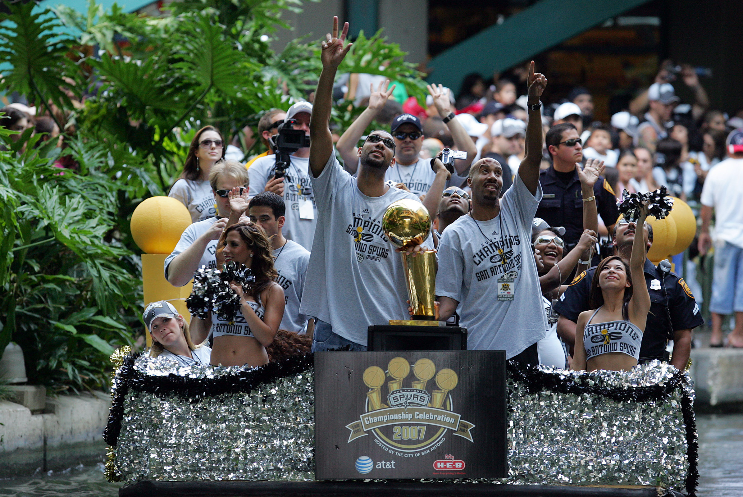SAN ANTONIO - JUNE 17:  Tim Duncan and Bruce Bowen (R) of the San Antonio Spurs wave to the fans during the NBA championship parade down the San Antonio River walk June 17, 2007 in San Antonio, Texas. NOTE TO USER: User expressly acknowledges and agrees t