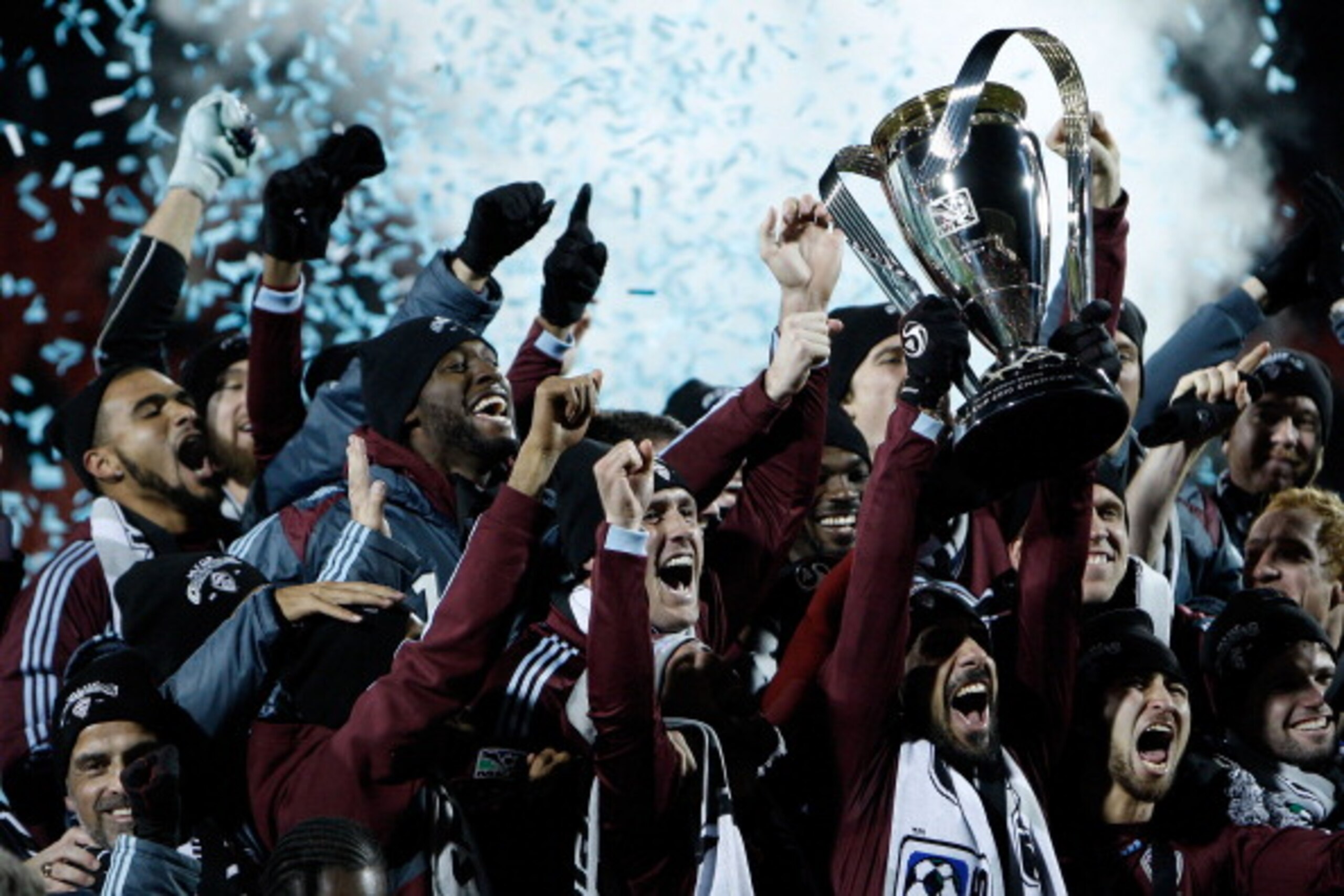 TORONTO, ON - NOVEMBER 21:  Captain Pablo Mastroeni #25 of the Colorado Rapids holds the Philip F. Anschutz Trophy and celebrates with teammates after their 2-1 overtime victory against FC Dallas during the 2010 MLS Cup match at BMO Field on November 21,