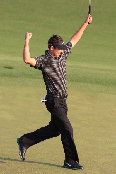 AUGUSTA, GA - APRIL 10:  Charl Schwartzel of South Africa celebrates his two-stroke victory on the 18th green during the final round of the 2011 Masters Tournament at Augusta National Golf Club on April 10, 2011 in Augusta, Georgia.  (Photo by David Canno