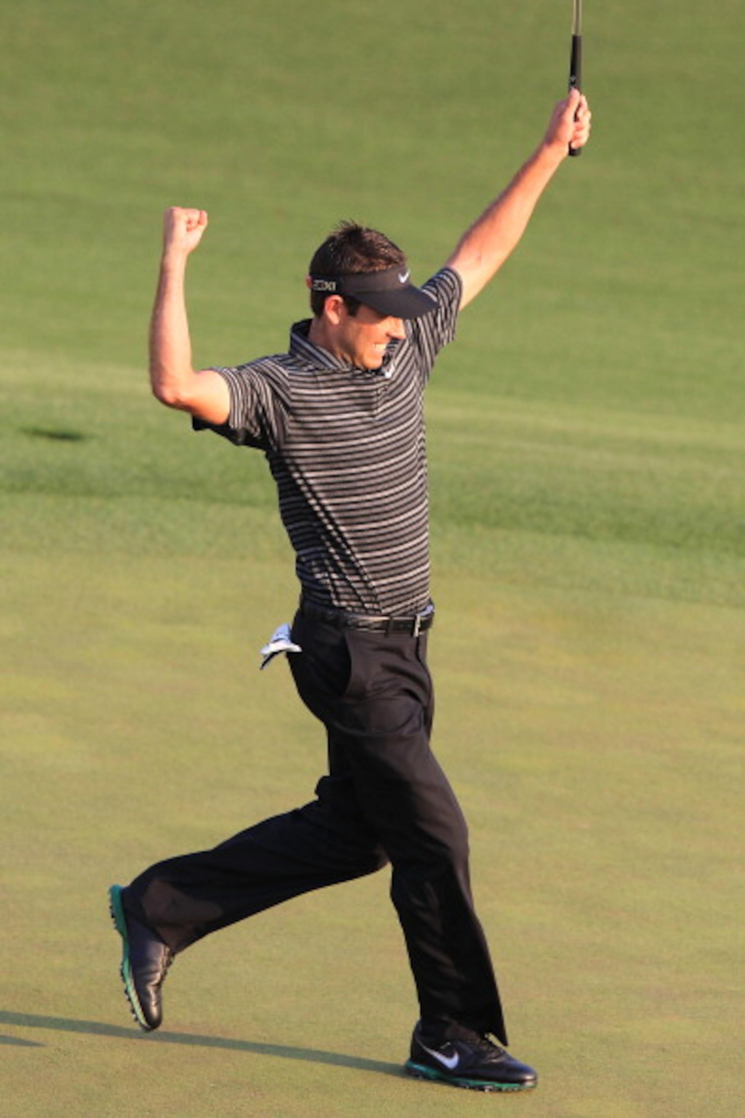 AUGUSTA, GA - APRIL 10: Charl Schwartzel of South Africa celebrates his two-stroke victory on the 18th green during the final round of the 2011 Masters Tournament at Augusta National Golf Club on April 10, 2011 in Augusta, Georgia. (Photo by David Canno AUGUSTA, GA - APRIL 10: Charl Schwartzel of South Africa celebrates his two-stroke victory on the 18th green during the final round of the 2011 Masters Tournament at Augusta National Golf Club on April 10, 2011 in Augusta, Georgia. (Photo by David Canno