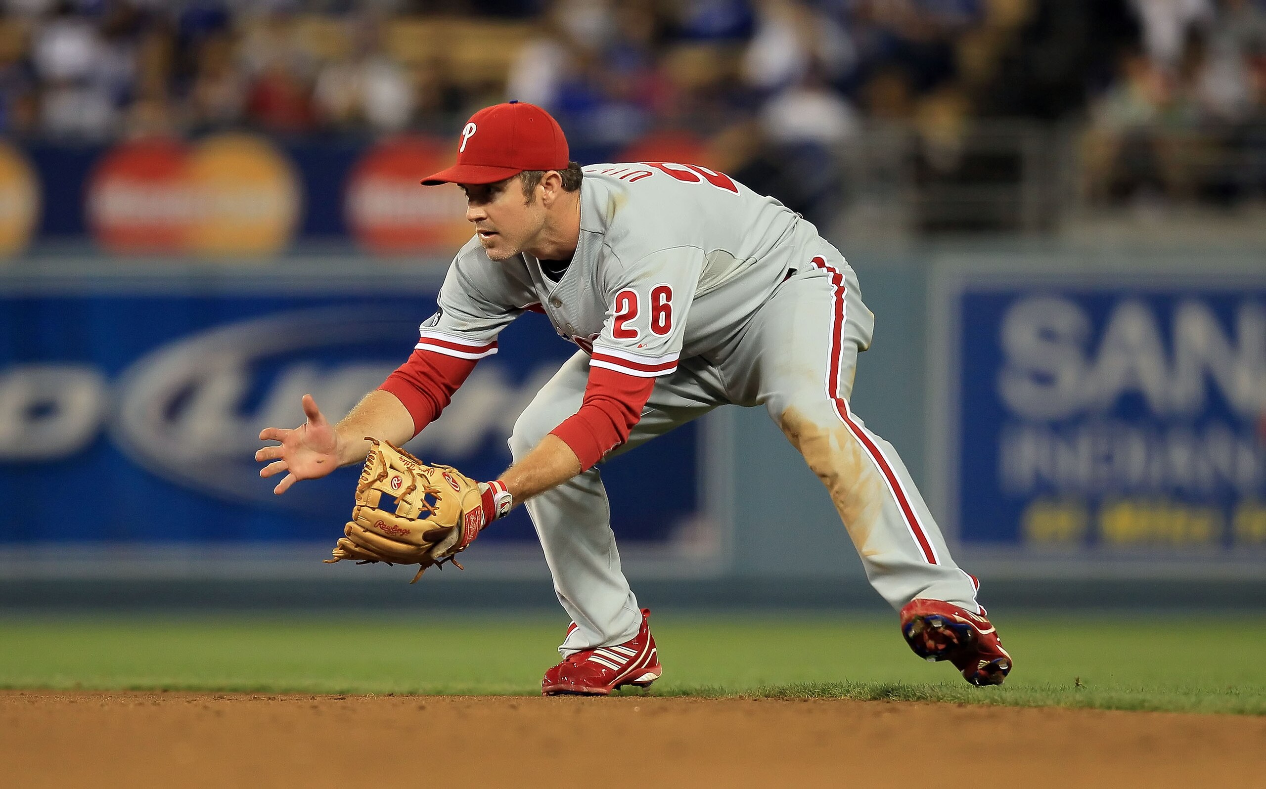 LOS ANGELES, CA - AUGUST 31:  Chase Utley #26 of the Philadelphia Phillies prepares to field a ground ball against the Los Angeles Dodgers at Dodger Stadium on August 31, 2010 in Los Angeles, California. The Phillies defeated the Dodgers 8-4.  (Photo by J