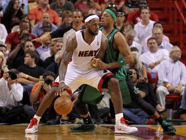 MIAMI, FL - APRIL 10:  LeBron James #6 of the Miami Heat posts up Paul Pierce #34 of the Boston Celtics during a game  at American Airlines Arena on April 10, 2011 in Miami, Florida. NOTE TO USER: User expressly acknowledges and agrees that, by downloadin