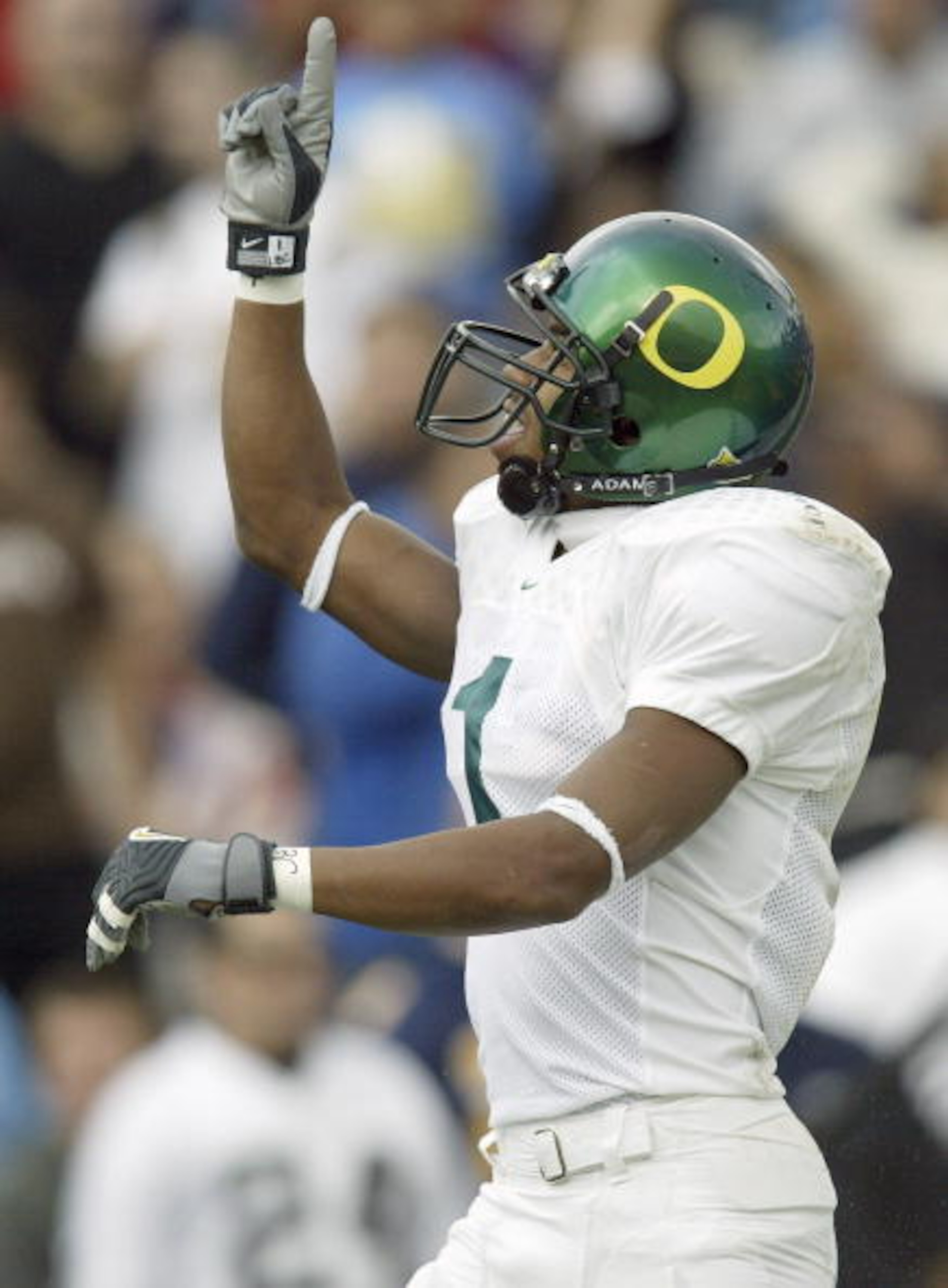 PASADENA, CA -NOVEMBER 15:  Wide receiver Samie Parker of the Oregon Ducks celebrates his long touchdown catch against the UCLA Bruins on November 15, 2003 at the Rose Bowl in Pasadena, California.   (Photo by Stephen Dunn/Getty Images)