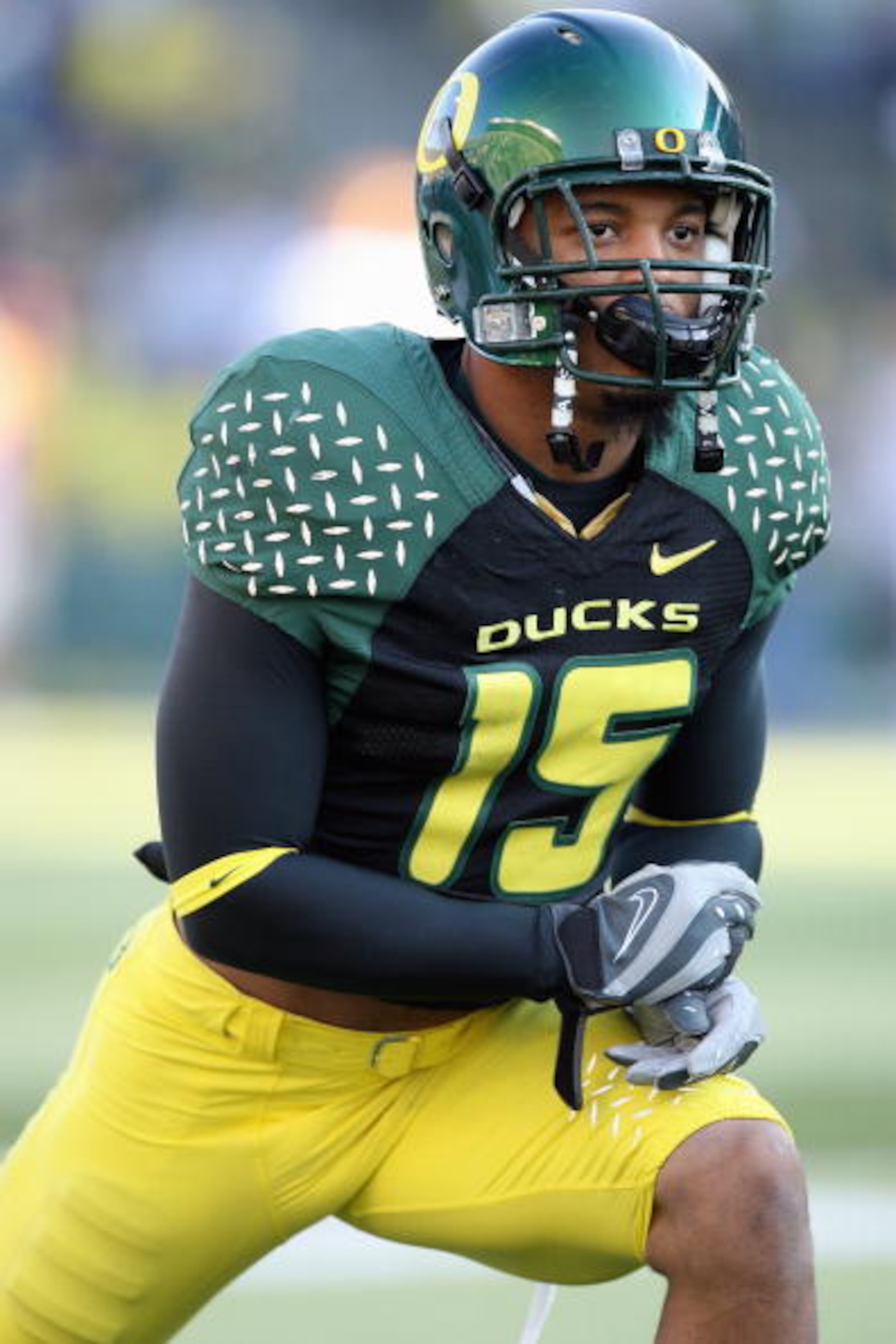 EUGENE, OR - NOVEMBER 03: Patrick Chung #15 of the Oregon Ducks stretches on the field before the game against the Arizona State Sun Devils at Autzen Stadium on November 3, 2007 in Eugene, Oregon. The Ducks defeated the Sun Devils 35-23. (Photo by Otto Gr