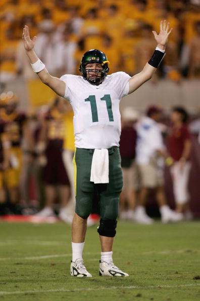 TEMPE, AZ - OCTOBER 08: Kellen Clemens #11 of the Oregon Ducks celebrates a touchdown against the Arizona St. Sun Devils on October 8, 2005 at Sun Devil Stadium Stadium in Tempe, Arizona. (Photo by Jonathan Ferrey/Getty Images) TEMPE, AZ - OCTOBER 08: Kellen Clemens #11 of the Oregon Ducks celebrates a touchdown against the Arizona St. Sun Devils on October 8, 2005 at Sun Devil Stadium Stadium in Tempe, Arizona. (Photo by Jonathan Ferrey/Getty Images)