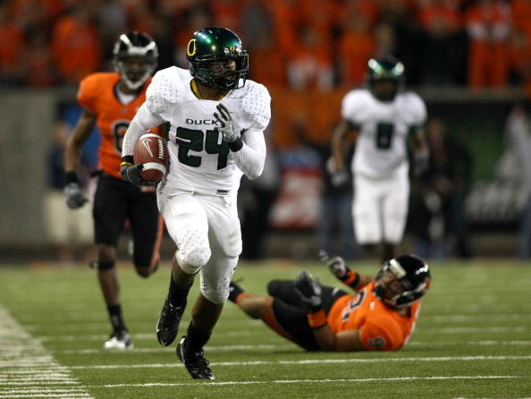 CORVALLIS, OR - NOVEMBER 29: Jeremiah Johnson #24 of the Oregon Ducks runs for an 83 yard touchdown in the 2nd quarter against the Oregon State Beavers at Reser Stadium on November 29, 2008 in Corvalis, Oregon. (Photo by Jonathan Ferrey/Getty Images) CORVALLIS, OR - NOVEMBER 29: Jeremiah Johnson #24 of the Oregon Ducks runs for an 83 yard touchdown in the 2nd quarter against the Oregon State Beavers at Reser Stadium on November 29, 2008 in Corvalis, Oregon. (Photo by Jonathan Ferrey/Getty Images)