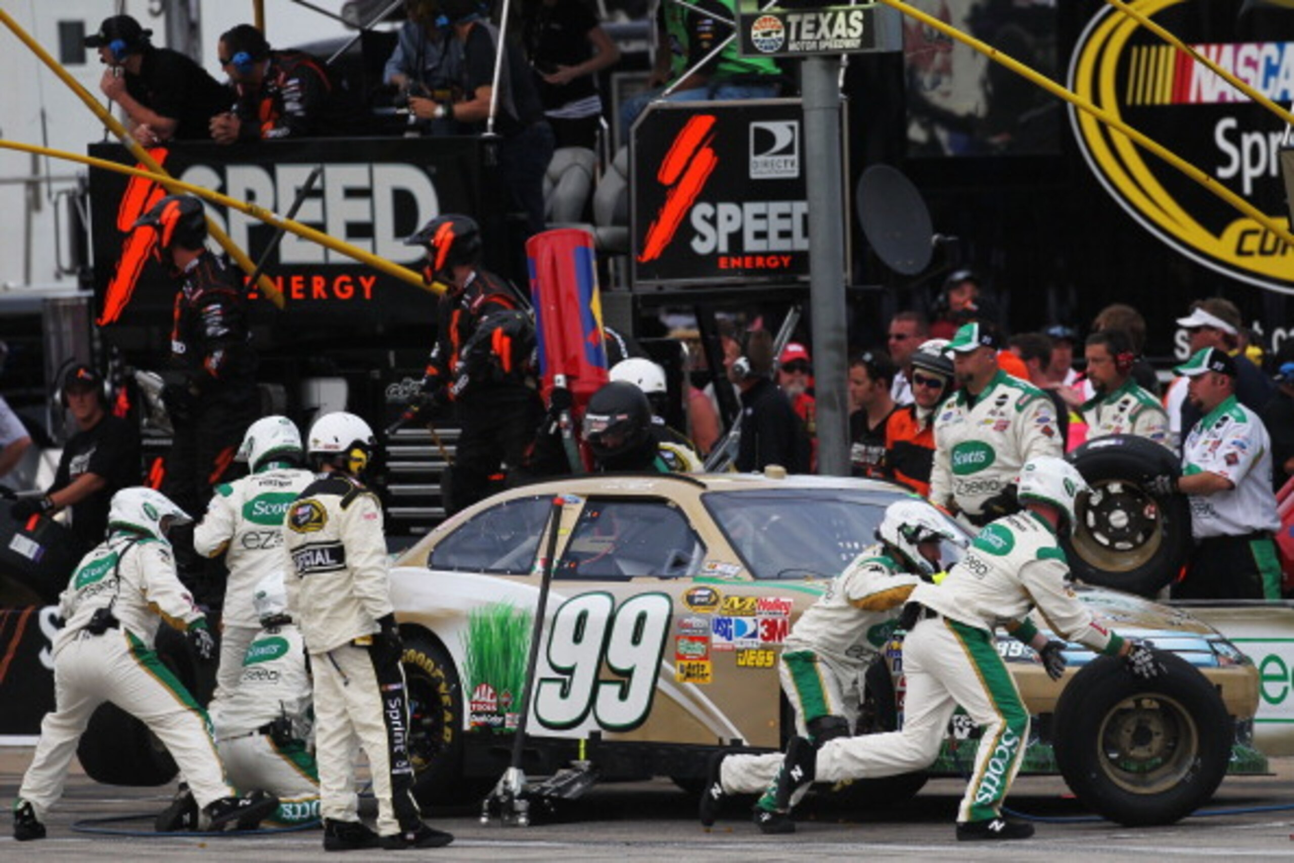 FORT WORTH, TX - APRIL 09:  Carl Edwards, driver of the #99 Scotts Ford, pits during the NASCAR Sprint Cup Series Samsung Mobile 500 at Texas Motor Speedway on April 9, 2011 in Fort Worth, Texas.  (Photo by Jonathan Ferrey/Getty Images for NASCAR)
