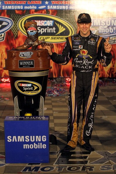 FORT WORTH, TX - APRIL 09:  Matt Kenseth, driver of the #17 Crown Royal Black Ford, posess in victory lane after winning the NASCAR Sprint Cup Series Samsung Mobile 500 at Texas Motor Speedway on April 9, 2011 in Fort Worth, Texas.  (Photo by Jason Smith/