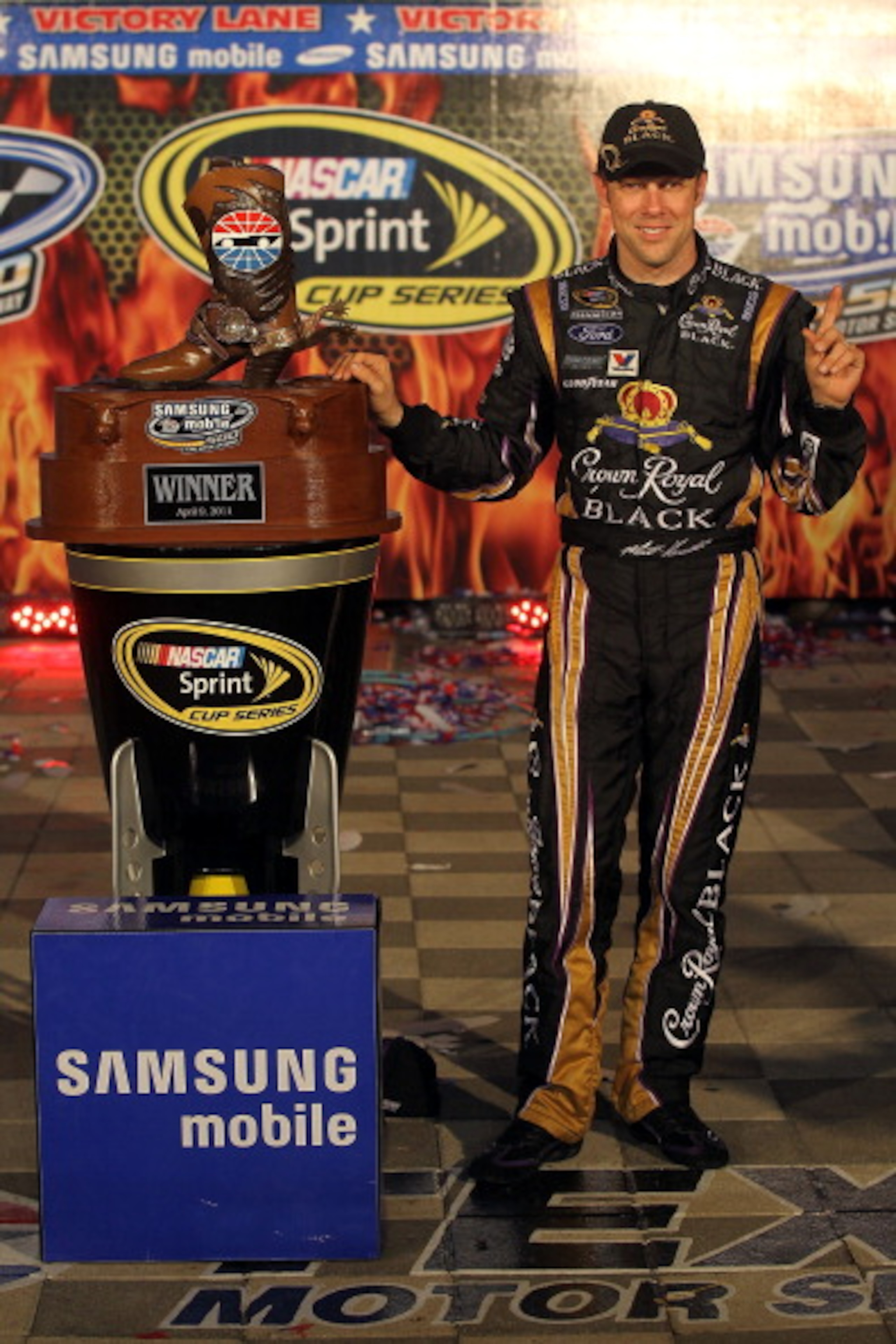 FORT WORTH, TX - APRIL 09:  Matt Kenseth, driver of the #17 Crown Royal Black Ford, posess in victory lane after winning the NASCAR Sprint Cup Series Samsung Mobile 500 at Texas Motor Speedway on April 9, 2011 in Fort Worth, Texas.  (Photo by Jason Smith/