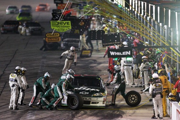FORT WORTH, TX - APRIL 09:  Dale Earnhardt Jr. pits the #88 Amp Energy/National Guard Chevrolet during the NASCAR Sprint Cup Series Samsung Mobile 500 at Texas Motor Speedway on April 9, 2011 in Fort Worth, Texas.  (Photo by Jonathan Ferrey/Getty Images f