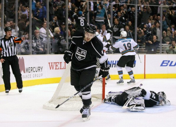 LOS ANGELES, CA - MARCH 24:  Drew Doughty #8 of the Los Angeles Kings reacts after Patrick Marleau #12 of the San Jose Sharks scored with less than five seconds left to tie the game 3-3 in the third period to force overtime during the NHL game at Staples
