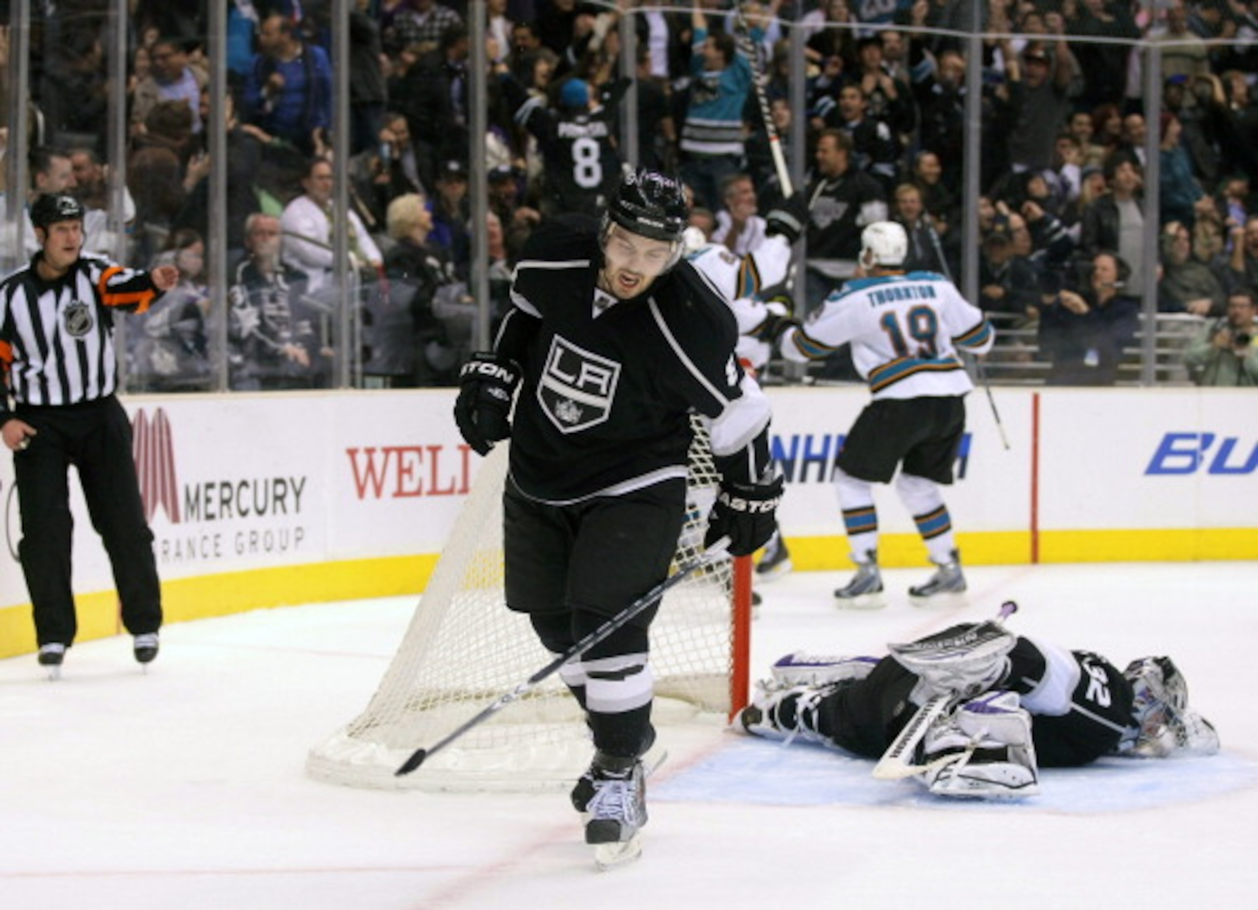 LOS ANGELES, CA - MARCH 24: Drew Doughty #8 of the Los Angeles Kings reacts after Patrick Marleau #12 of the San Jose Sharks scored with less than five seconds left to tie the game 3-3 in the third period to force overtime during the NHL game at Staples LOS ANGELES, CA - MARCH 24: Drew Doughty #8 of the Los Angeles Kings reacts after Patrick Marleau #12 of the San Jose Sharks scored with less than five seconds left to tie the game 3-3 in the third period to force overtime during the NHL game at Staples