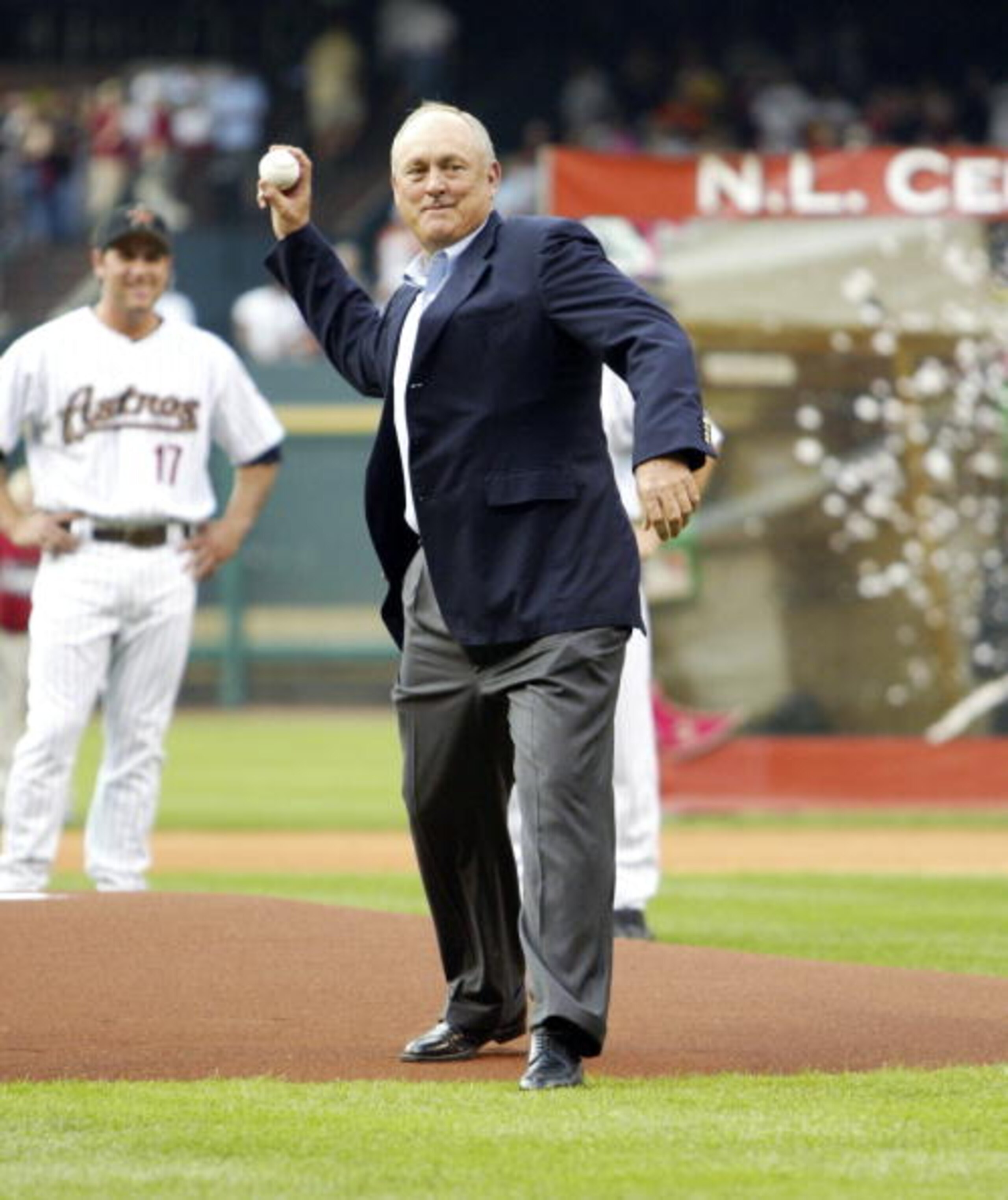HOUSTON - APRIL 3:  Baseball Legend Nolan Ryan throws out the first pitch before the Florida Marlins play the Houston Astros on April 3, 2006 at Minute Maid Park in Houston, Texas. (Photo by Bill Baptist/Getty Images)