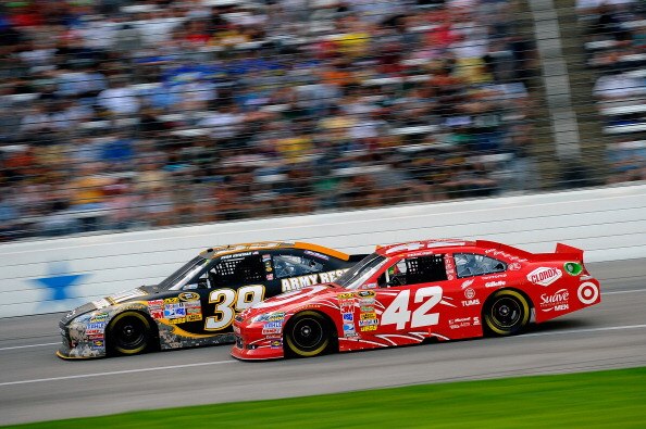 FORT WORTH, TX - APRIL 09:  Ryan Newman, driver of the #39 U.S. Army Reserve Chevrolet, races Juan Pablo Montoya, driver of the #42 Target Chevrolet, during the NASCAR Sprint Cup Series Samsung Mobile 500 at Texas Motor Speedway on April 9, 2011 in Fort W