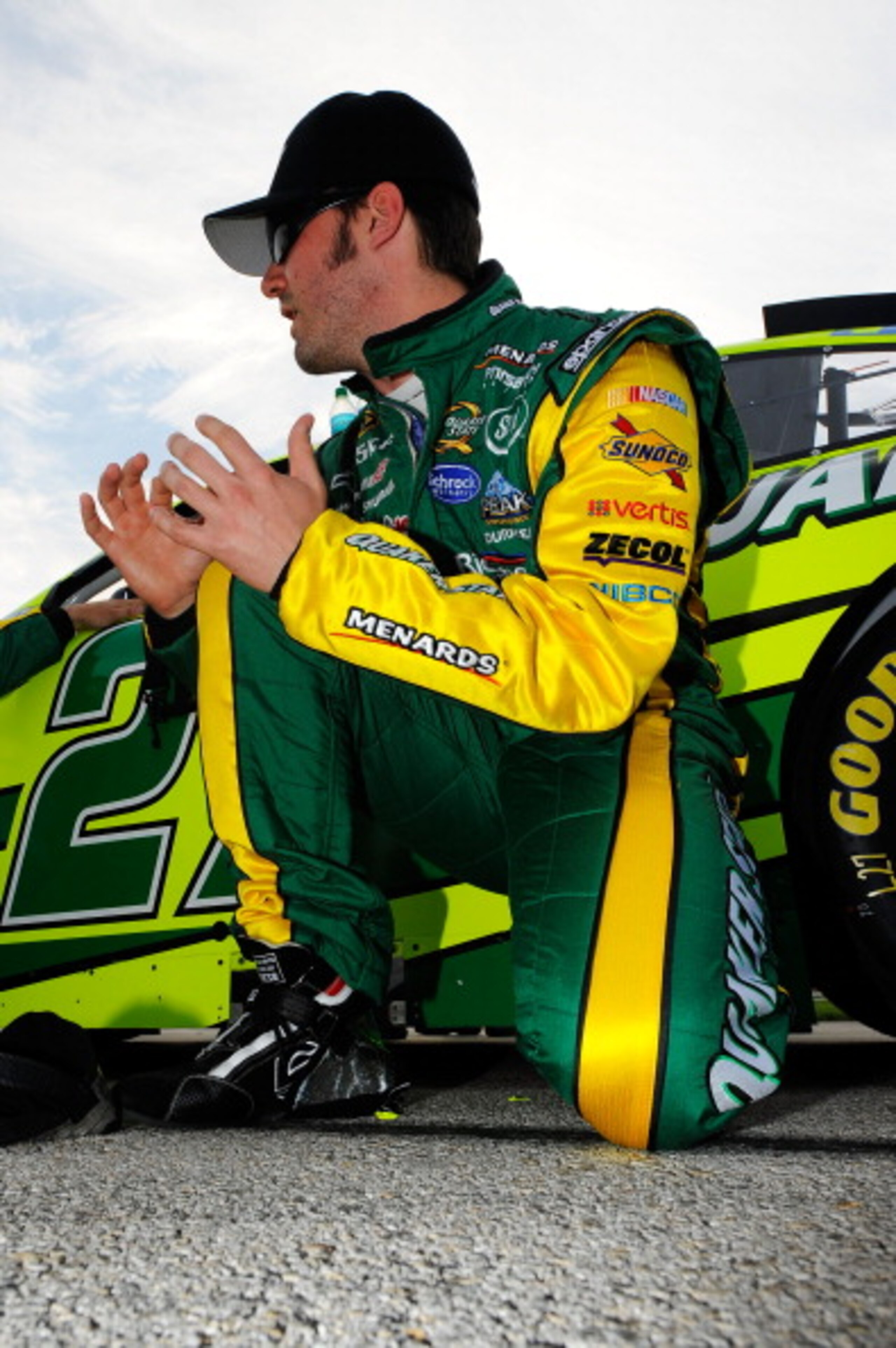 FORT WORTH, TX - APRIL 09:  Paul Menard, driver of the #27 Quaker State/Menards Chevrolet, kneels on the grid prior to the start of the NASCAR Sprint Cup Series Samsung Mobile 500 at Texas Motor Speedway on April 9, 2011 in Fort Worth, Texas.  (Photo by J