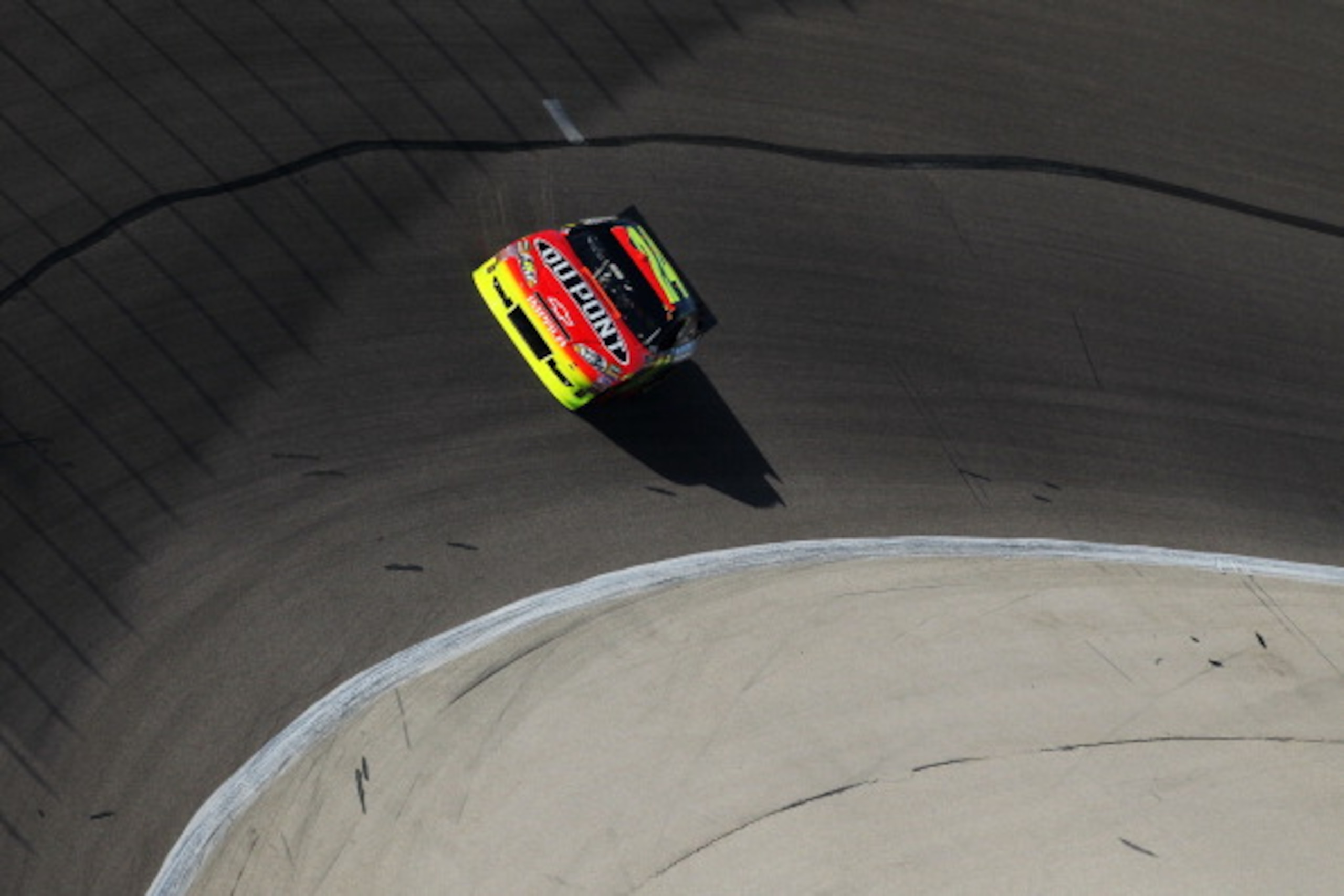 FORT WORTH, TX - APRIL 08:  Jeff Gordon, driver of the #24 DuPont Chevrolet, qualifies for the NASCAR Sprint Cup Series Samsung Mobile 500 at Texas Motor Speedway on April 8, 2011 in Fort Worth, Texas.  (Photo by Jonathan Ferrey/Getty Images for NASCAR)